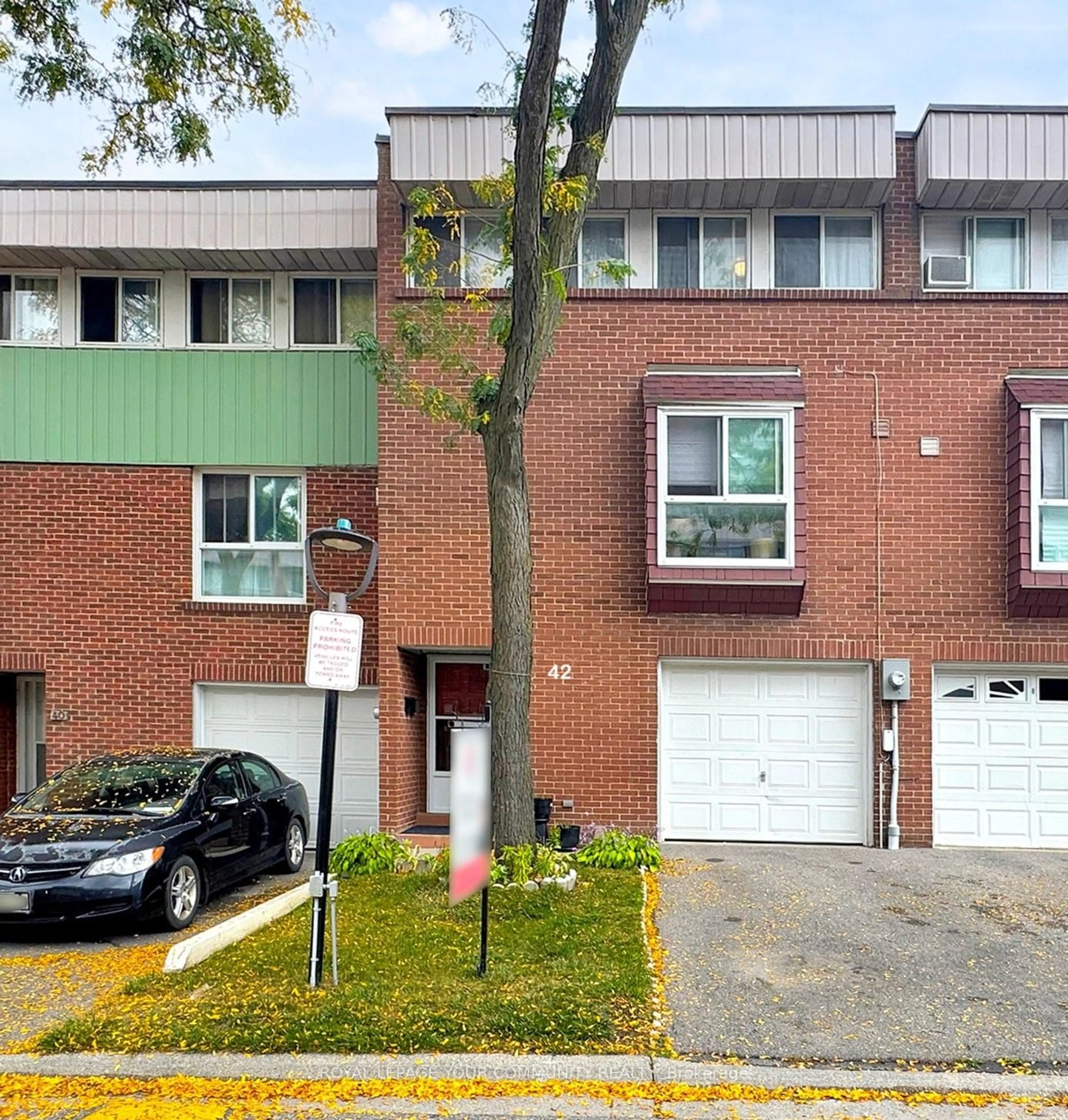 Home with brick exterior material, street for 42 John Cabot Way #72, Toronto Ontario M3N 2T7