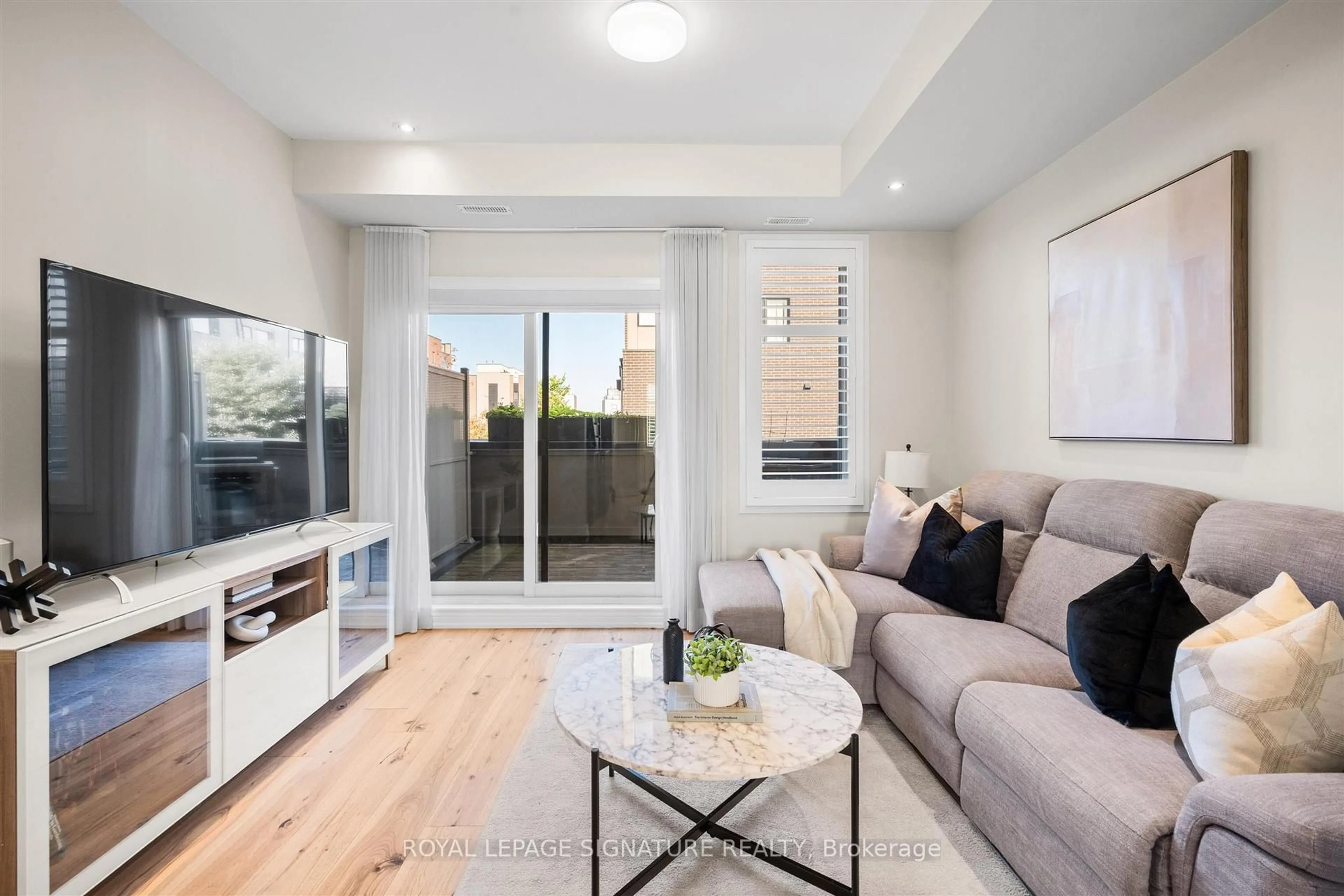 Living room with furniture, unknown for 120 Frederick Tisdale Dr #2, Toronto Ontario M3K 0A8
