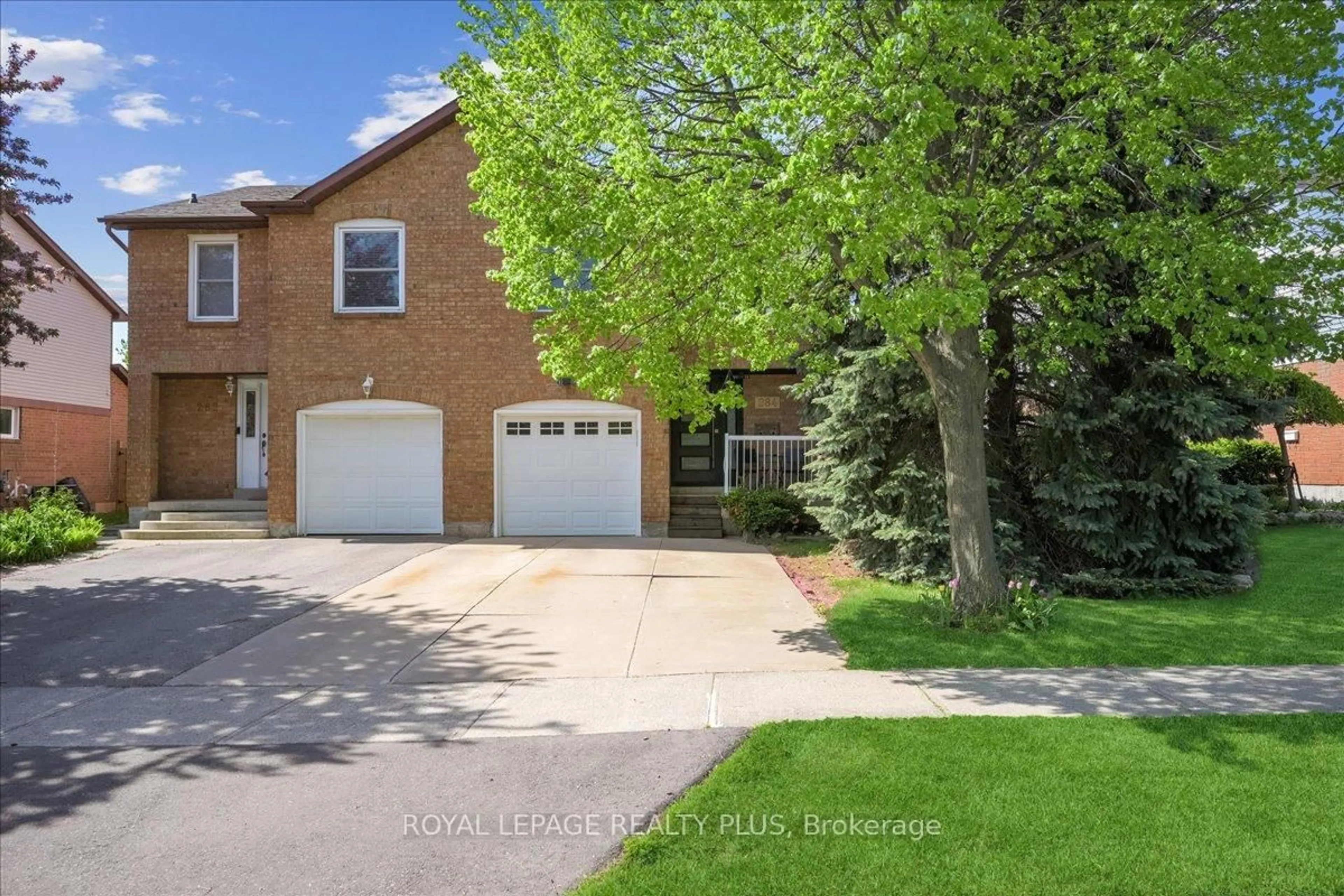 Home with brick exterior material, street for 284 Rimmington Dr, Oakville Ontario L6H 3N5