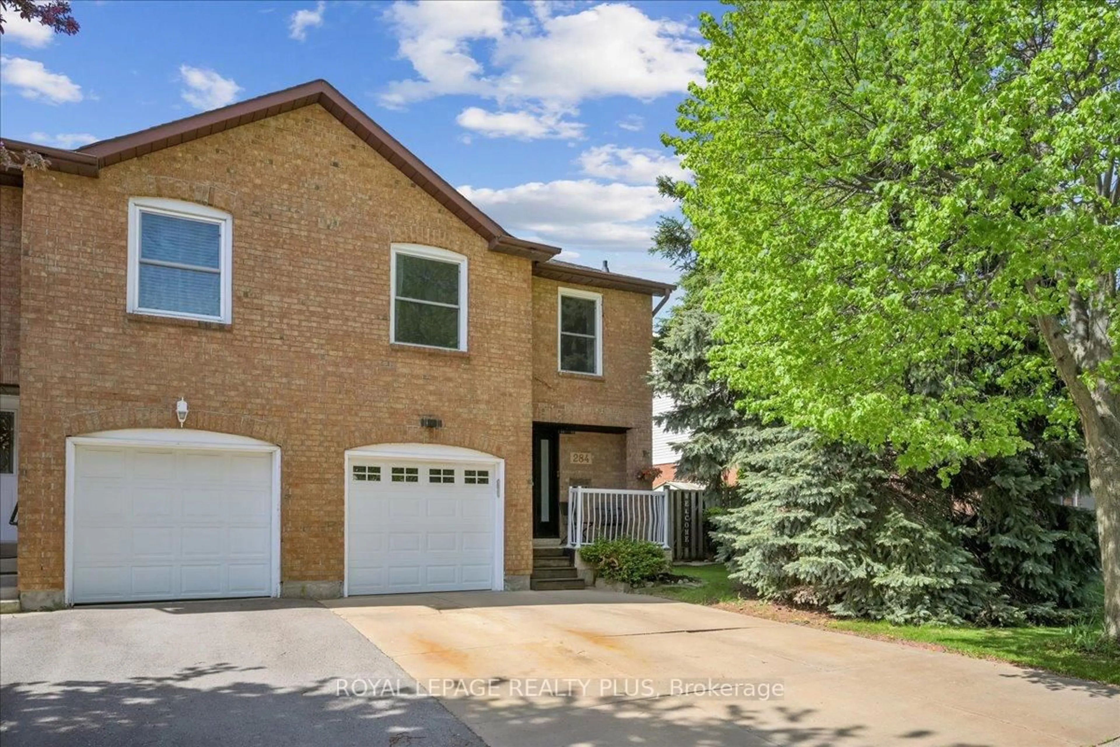 Home with brick exterior material, street for 284 Rimmington Dr, Oakville Ontario L6H 3N5