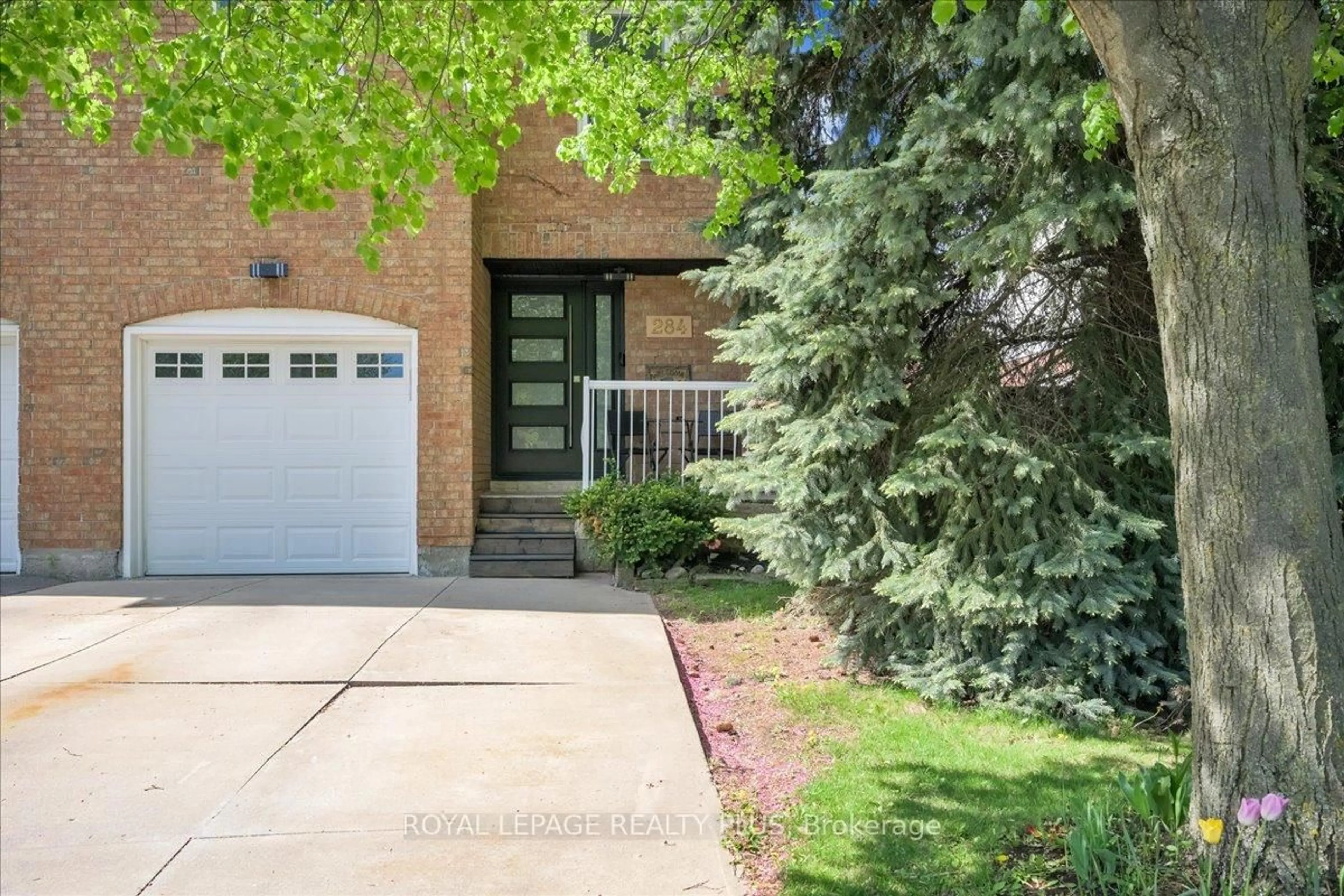 Home with brick exterior material, street for 284 Rimmington Dr, Oakville Ontario L6H 3N5
