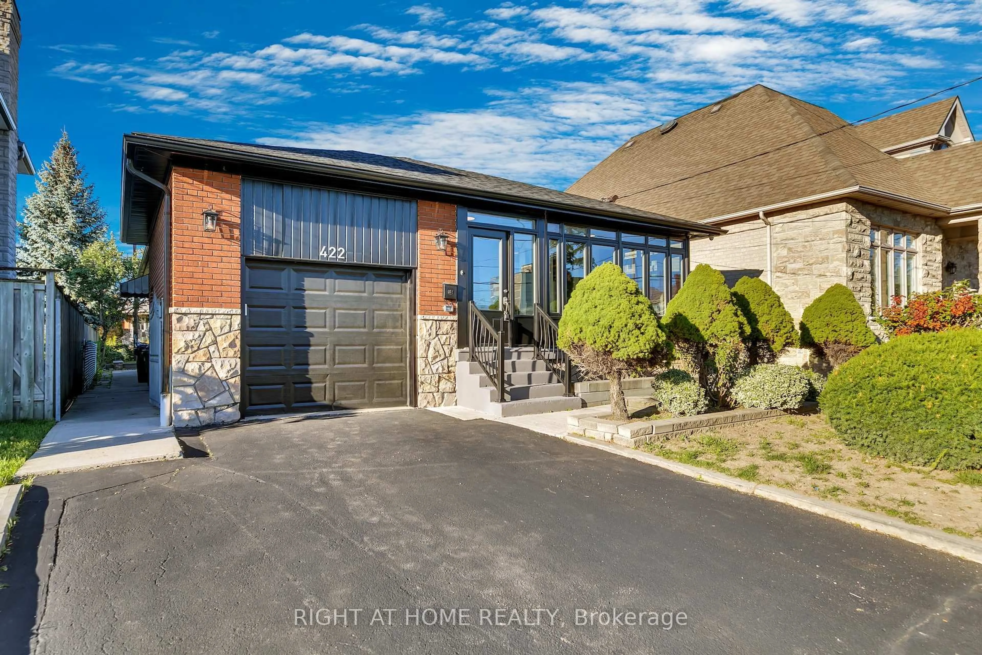 Home with brick exterior material, street for 422 Maple Leaf Dr, Toronto Ontario M6L 1P7