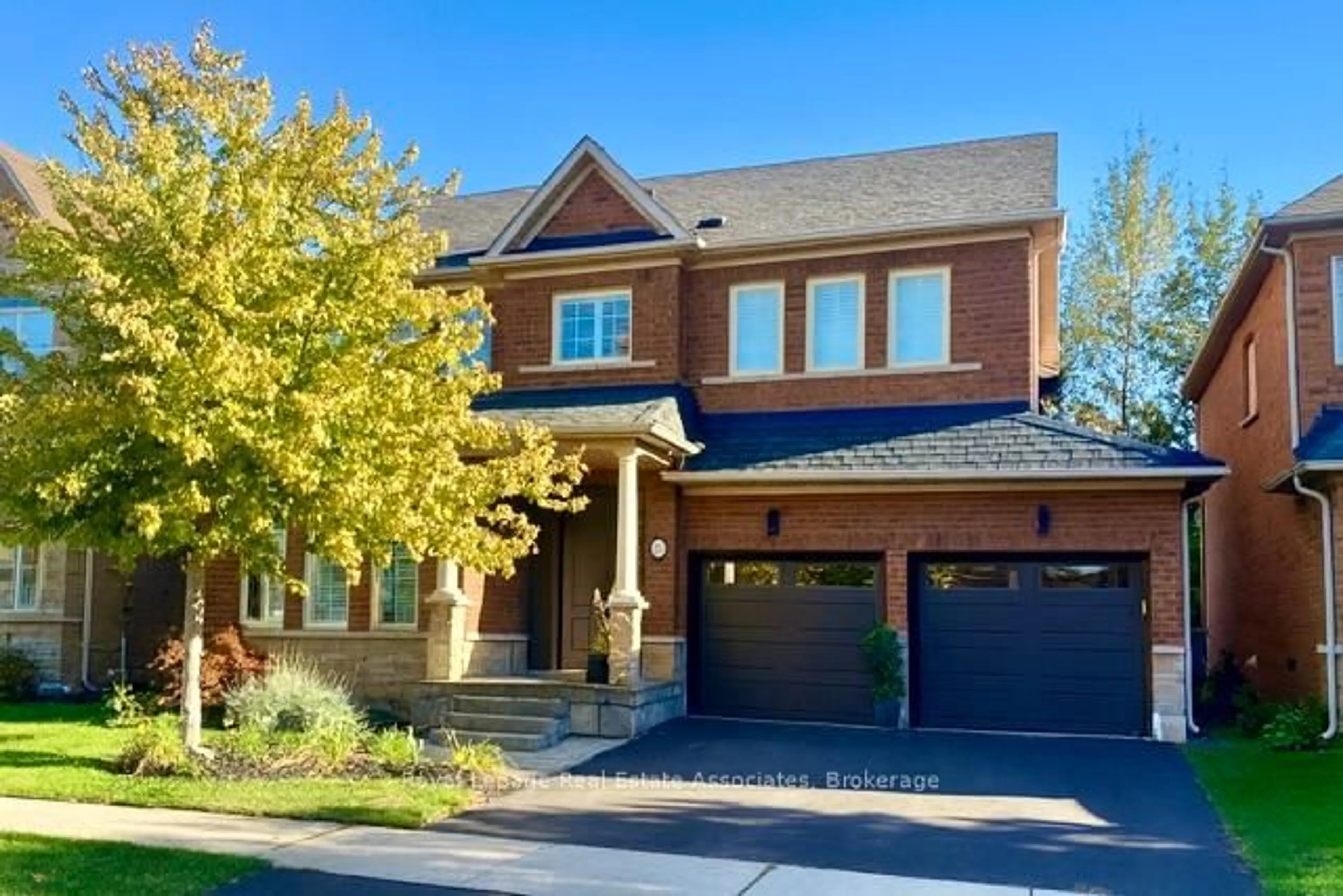 Home with brick exterior material, street for 273 Duskywing Way, Oakville Ontario L6L 6X5