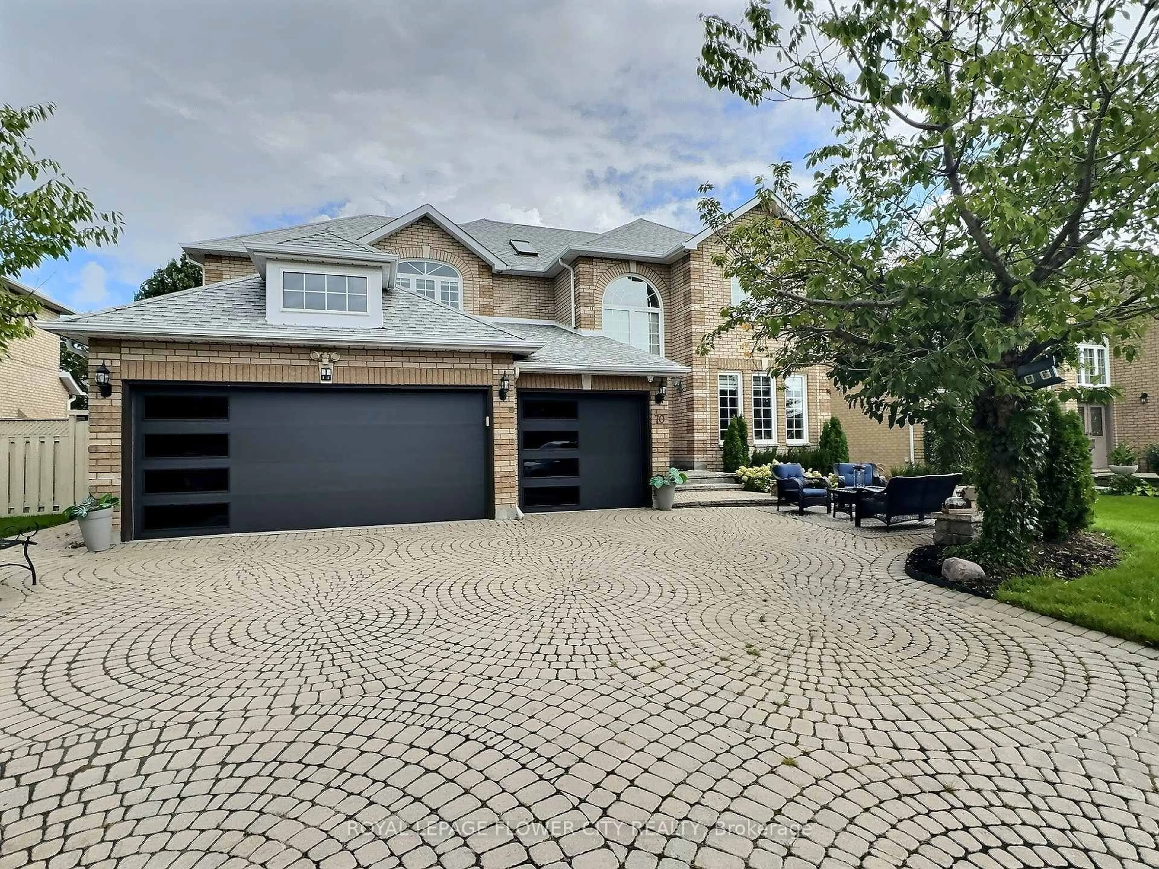 Home with brick exterior material, street for 70 Colonel Bertram Rd, Brampton Ontario L6Z 4T6