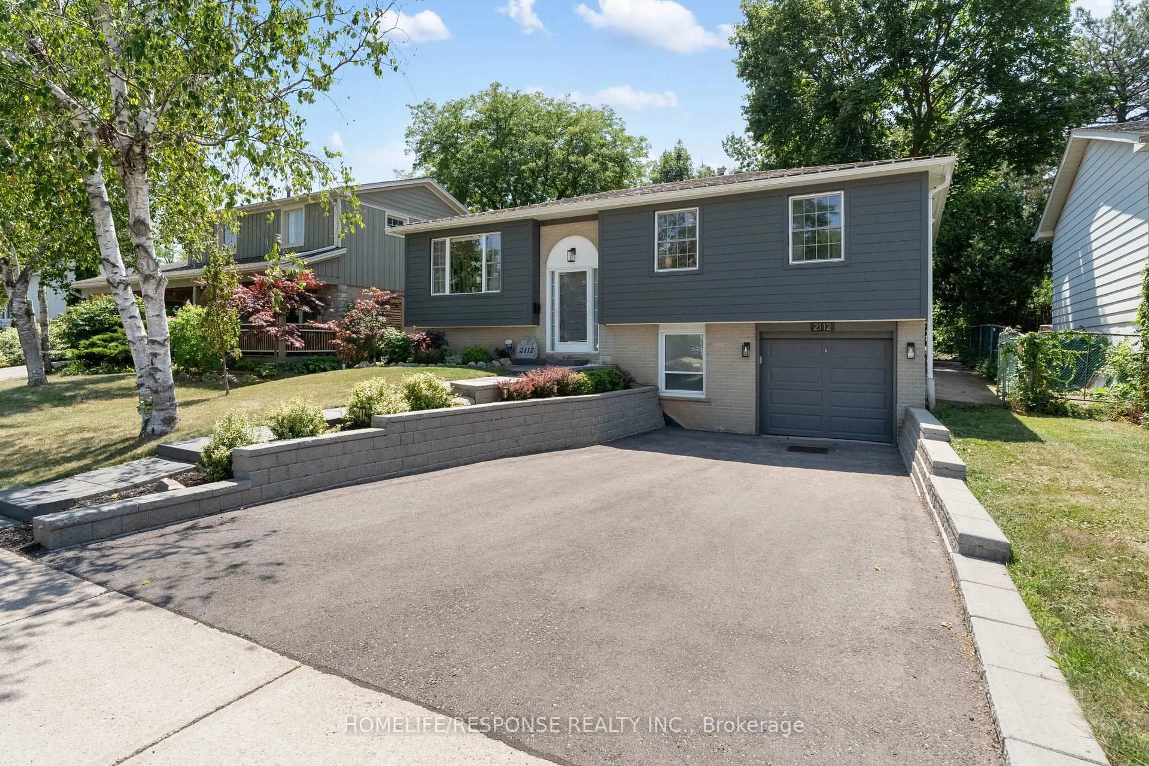 Home with vinyl exterior material, street for 2112 SOUTH MILLWAY, Mississauga Ontario L5L 1A6