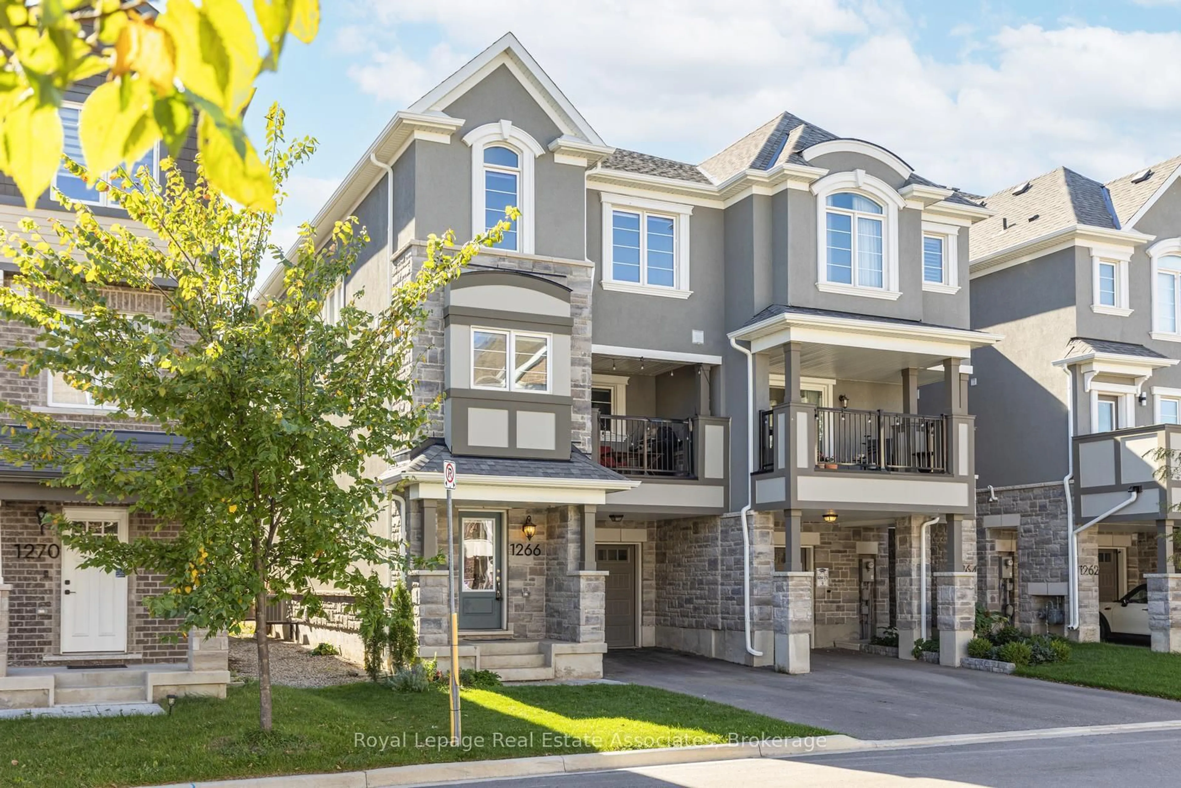 Home with vinyl exterior material, street for 1266 Hop Pl, Milton Ontario L9E 1S4