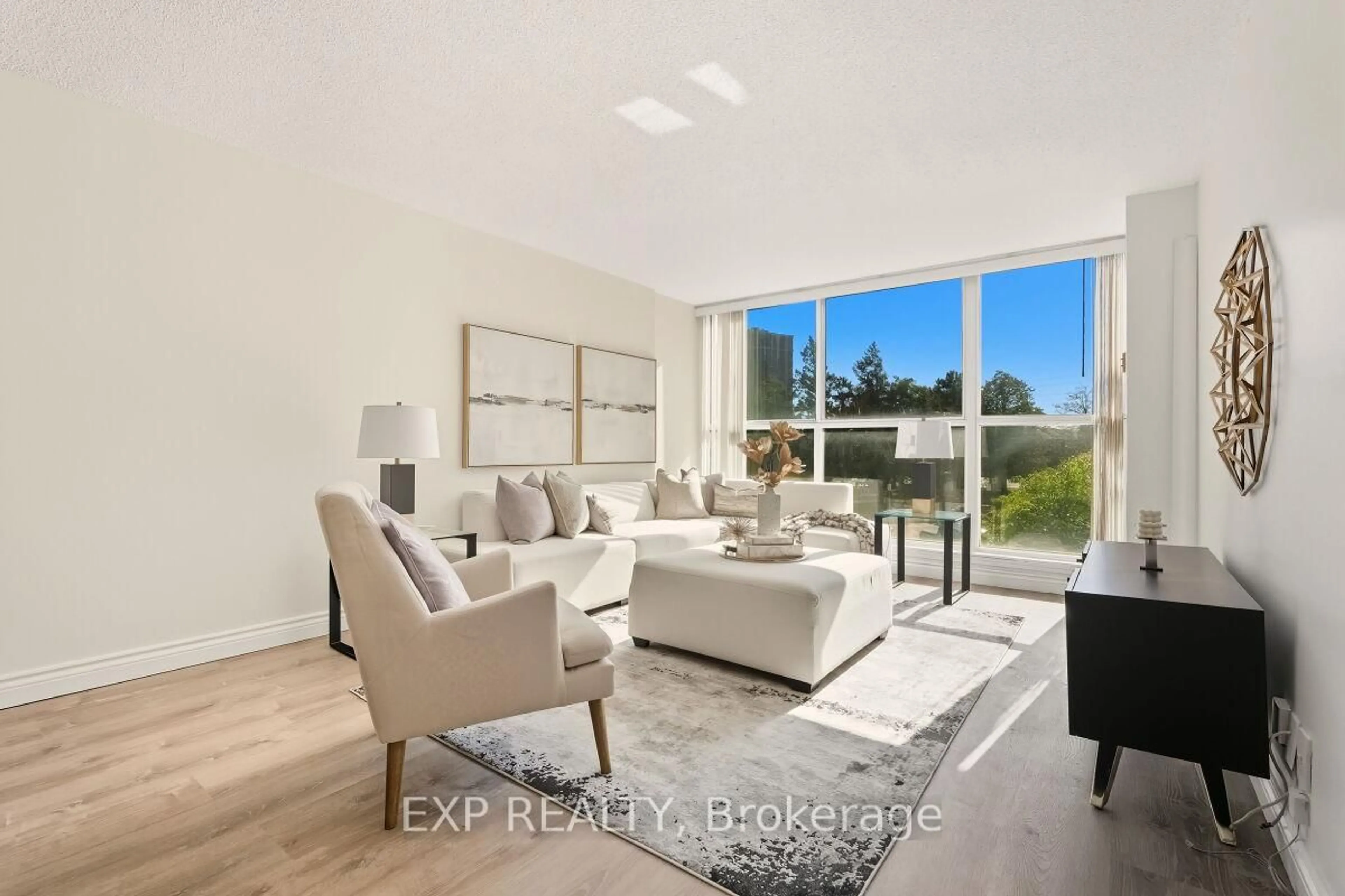 Living room with furniture, unknown for 35 Trailwood Dr #217, Mississauga Ontario L4Z 3L6