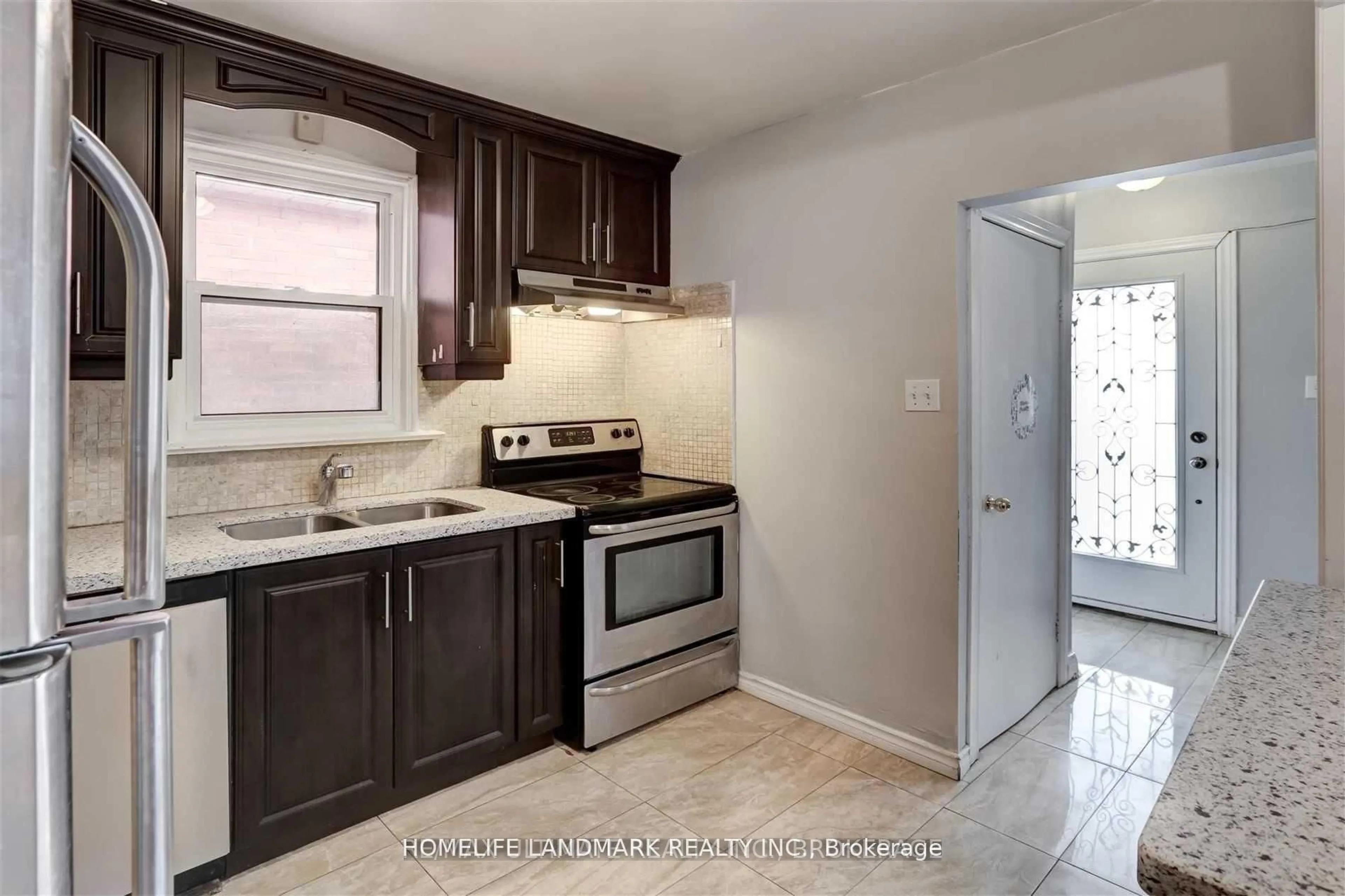 Standard kitchen, ceramic/tile floor for 67 Bala Ave, Toronto Ontario M6M 2E2
