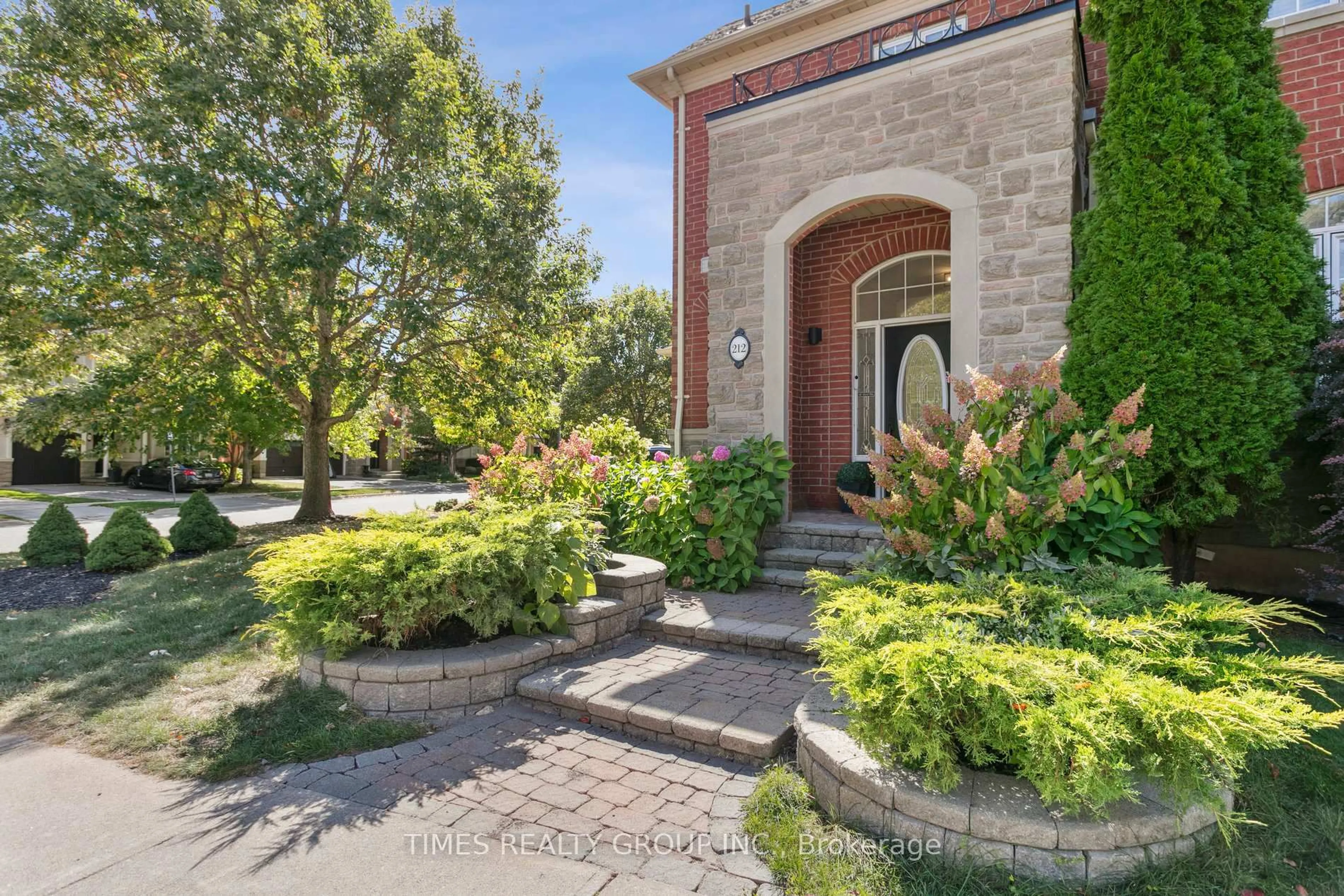 Home with brick exterior material, street for 212 Creek Path Ave, Oakville Ontario L6L 6T5