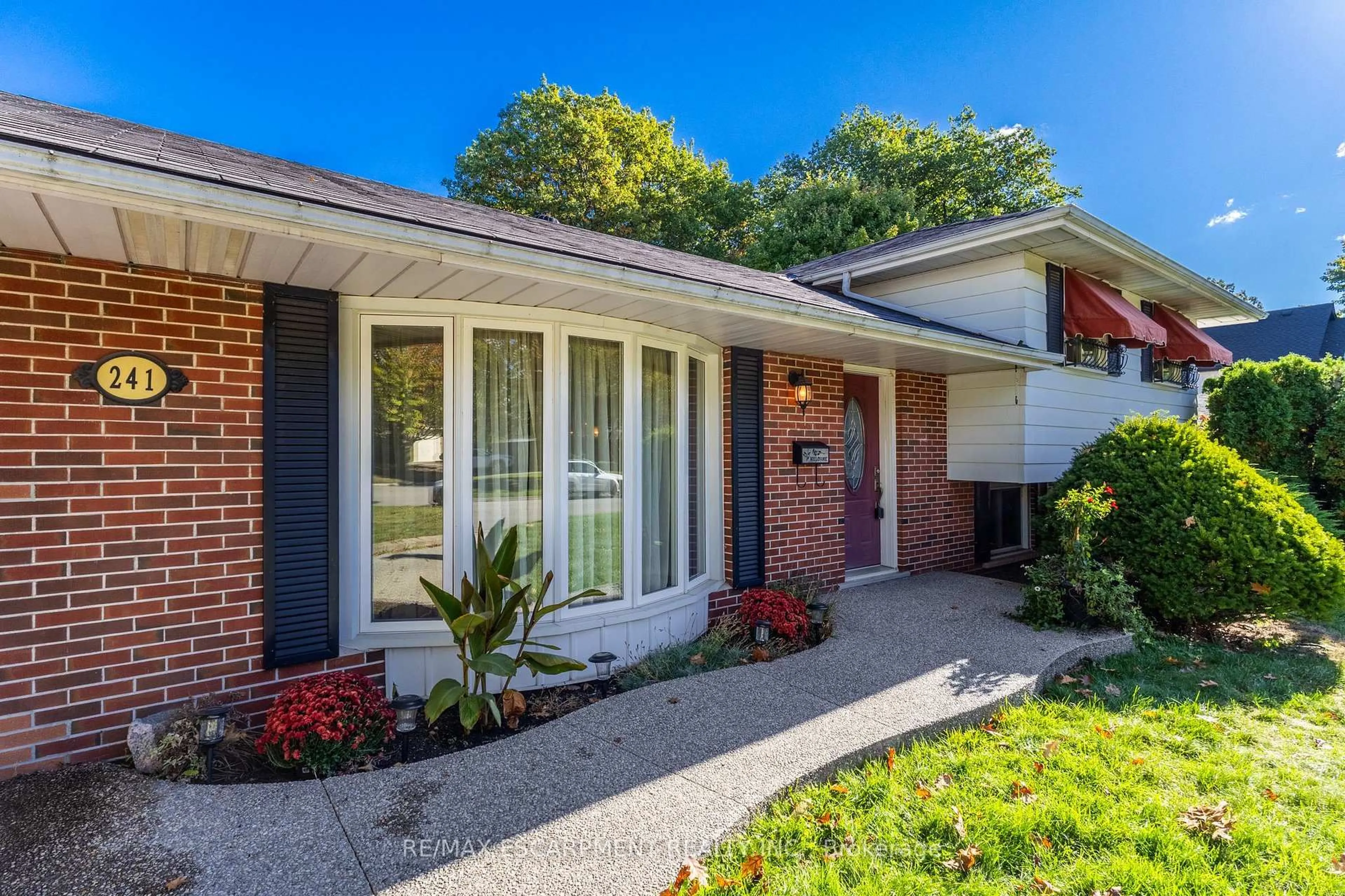 Home with brick exterior material, street for 241 TOTTENHAM Rd, Burlington Ontario L7L 4G5
