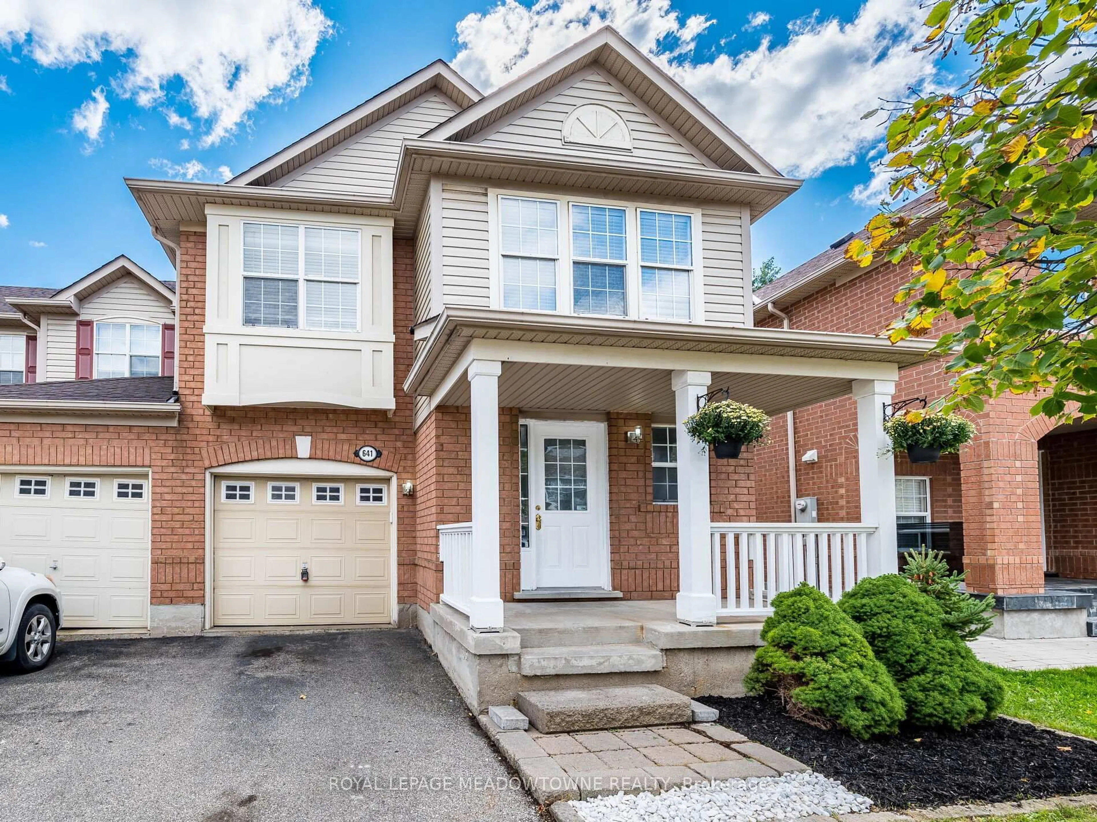 Home with brick exterior material, street for 641 Porter Way, Milton Ontario L9T 5W2