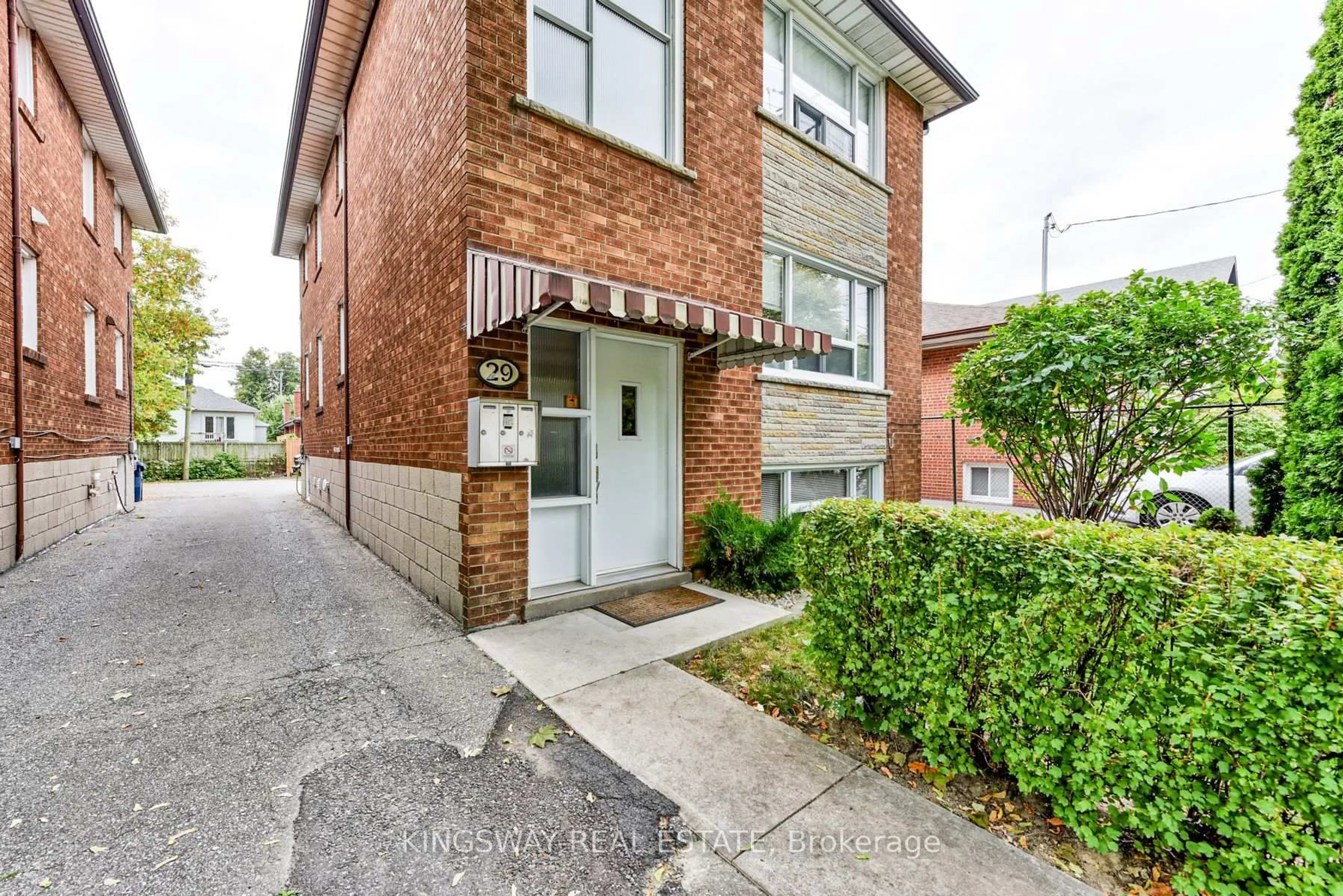 Home with brick exterior material, street for 29 Evans Ave, Toronto Ontario M6S 3V7