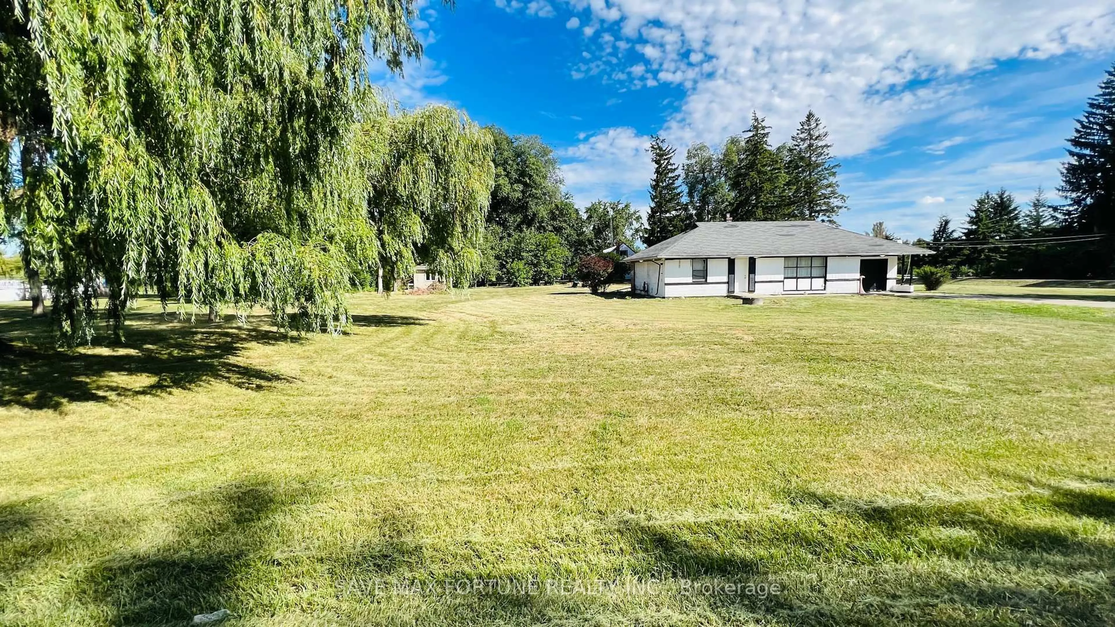 A pic from outside/outdoor area/front of a property/back of a property/a pic from drone, water/lake/river/ocean view for 59 Marysfield Dr, Brampton Ontario L6P 0J2
