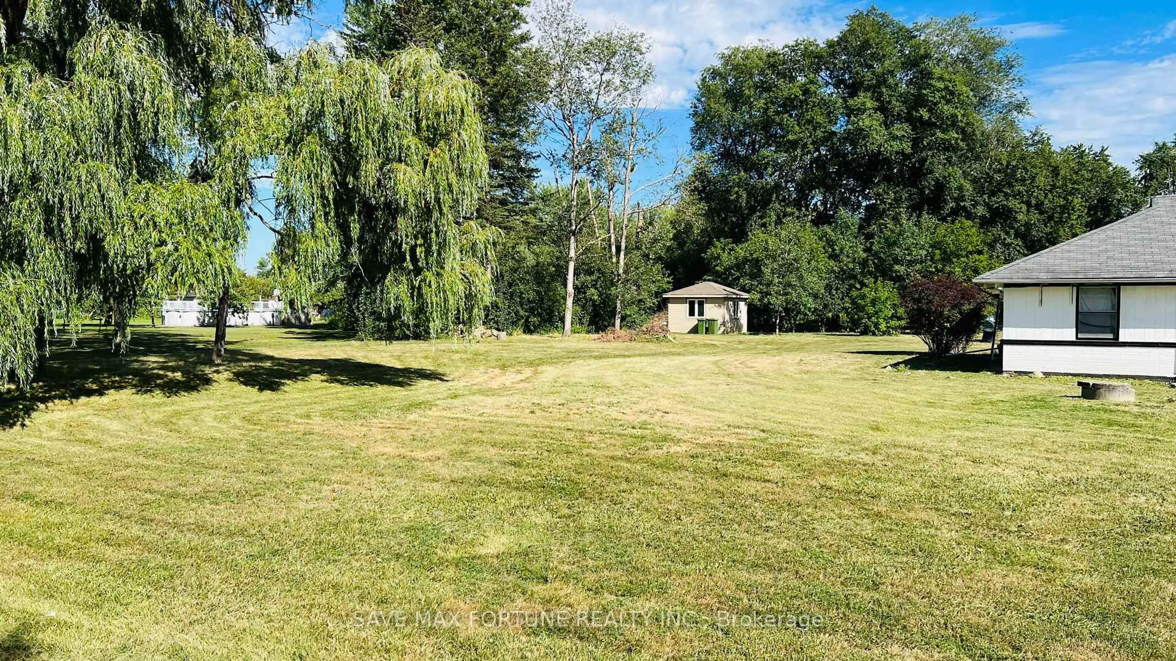 A pic from outside/outdoor area/front of a property/back of a property/a pic from drone, forest/trees view for 59 Marysfield Dr, Brampton Ontario L6P 0J2