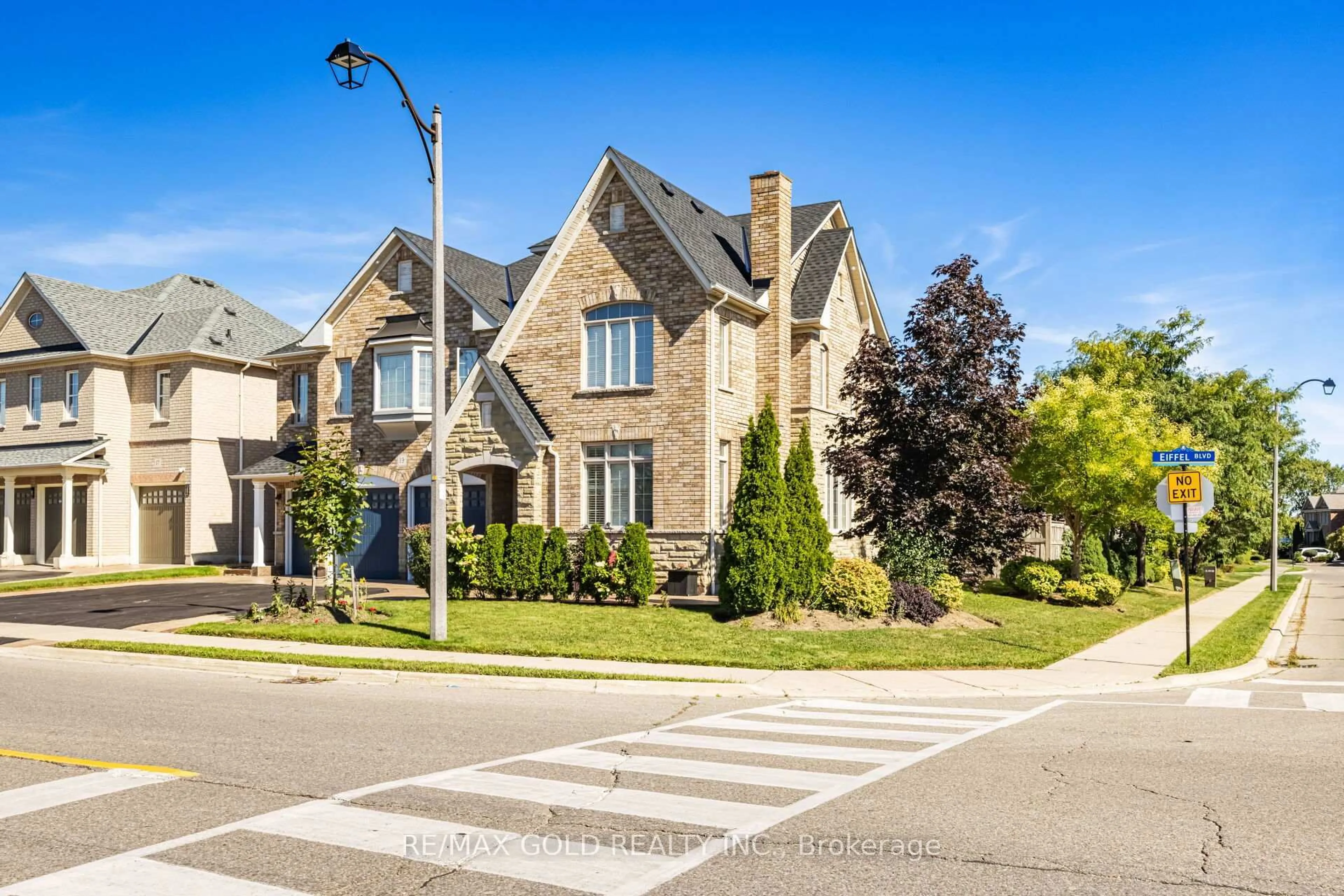 Home with brick exterior material, street for 19 Eiffel Blvd, Brampton Ontario L6P 1V9