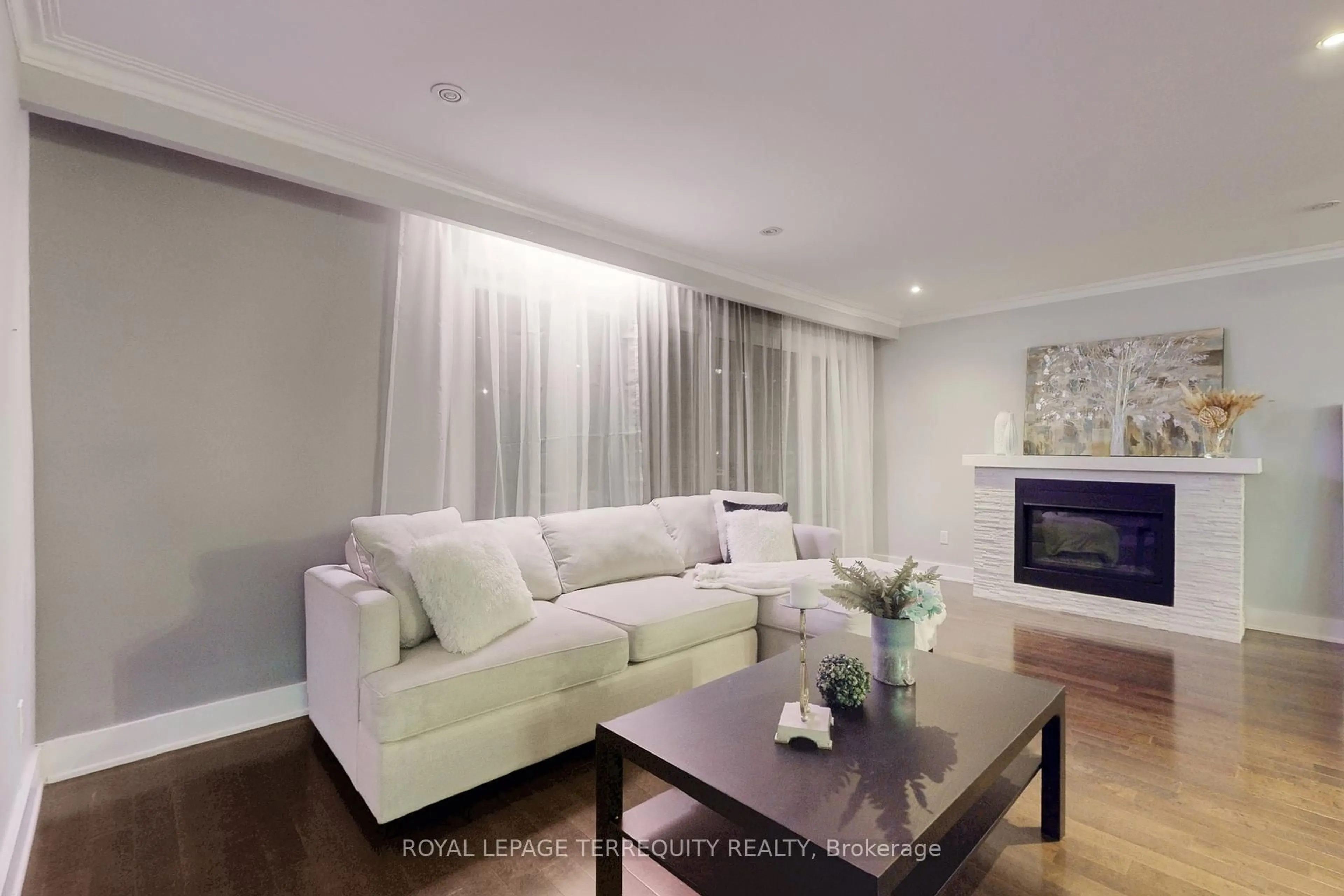 Living room with furniture, wood/laminate floor for 2 Stockton Rd, Toronto Ontario M6A 1K7
