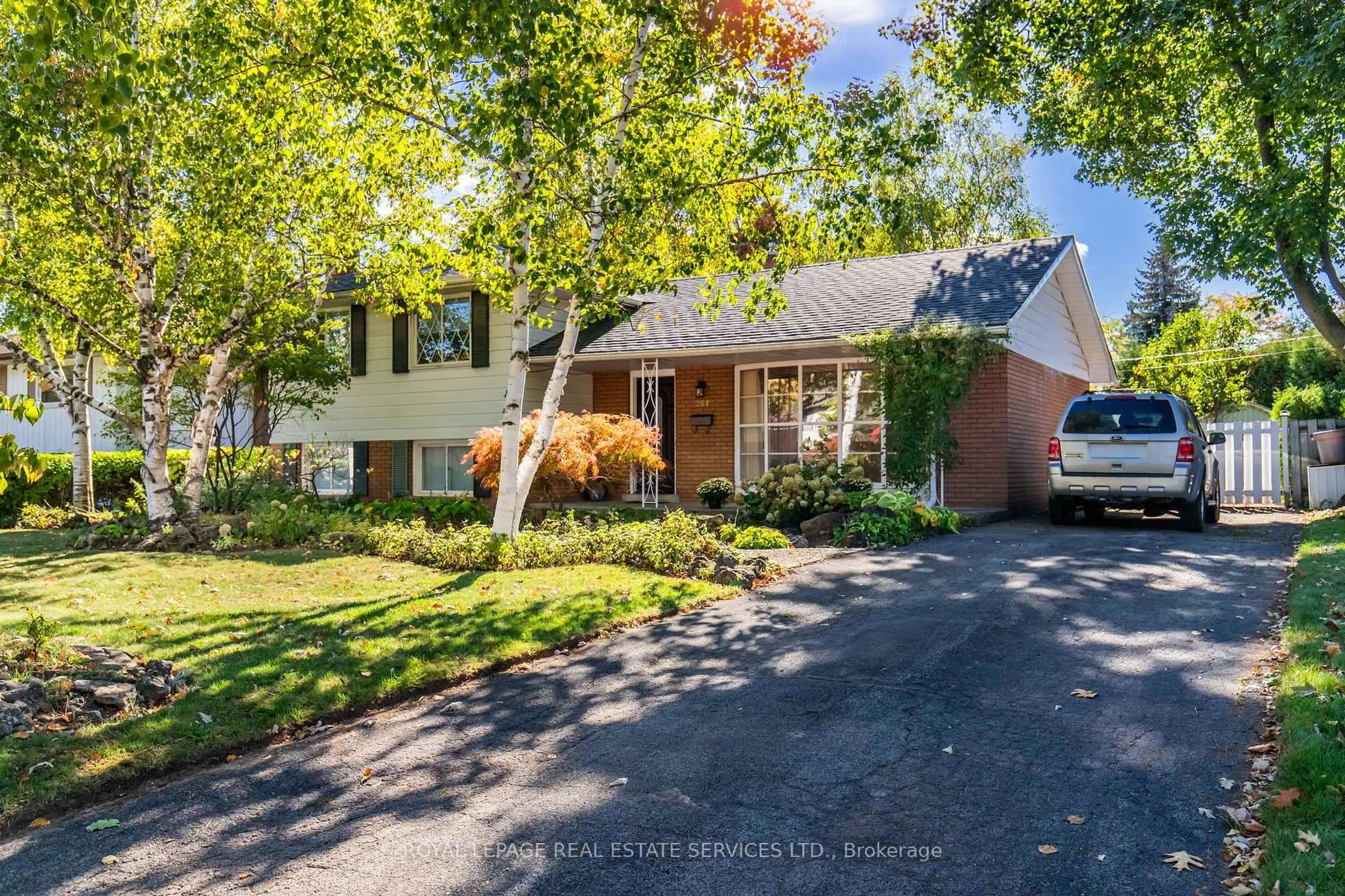 Home with brick exterior material, street for 264 Tottenham Rd, Burlington Ontario L7L 4G7