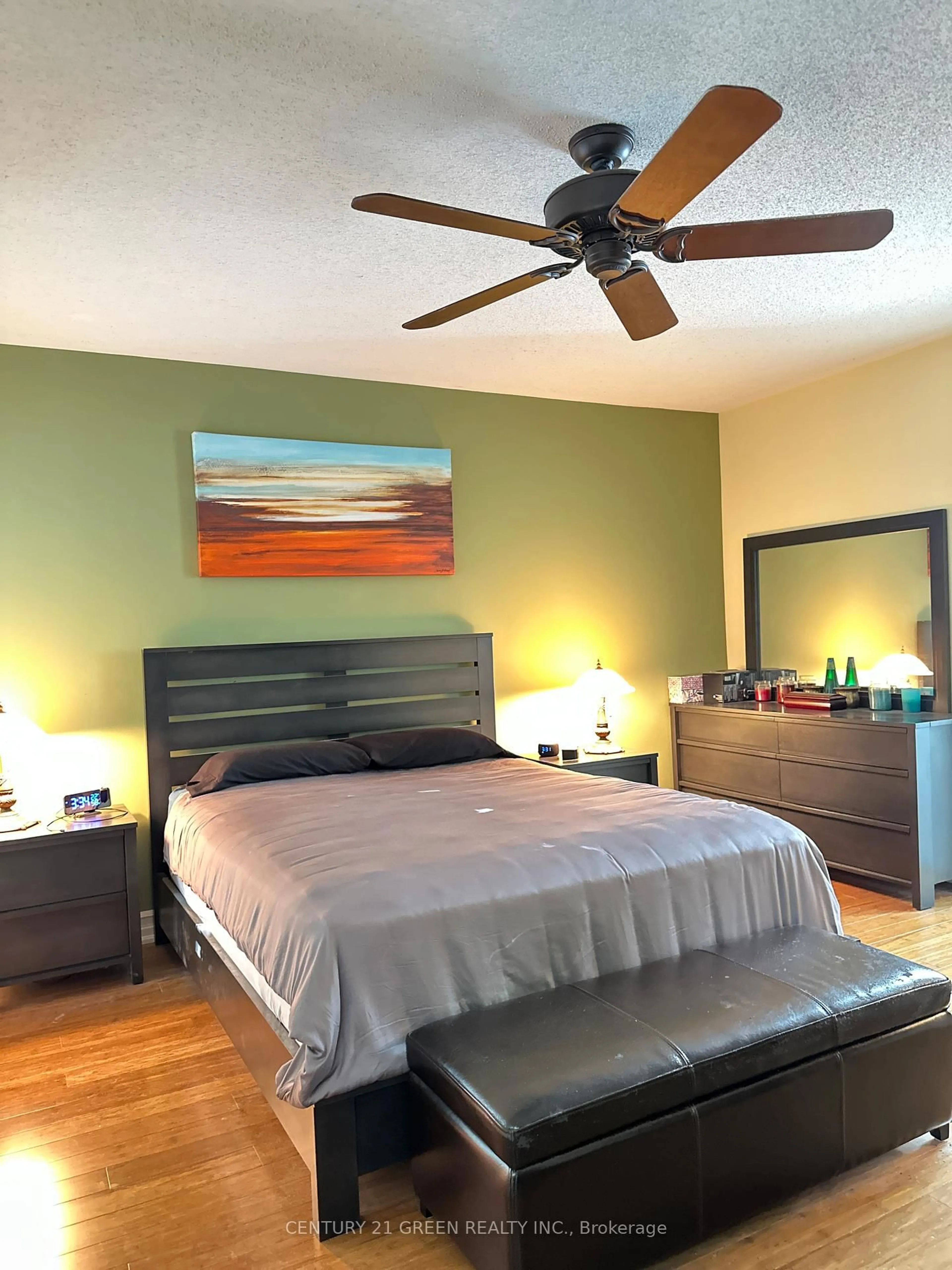 Bedroom with bed, wood/laminate floor for 5530 Glen Erin Dr #28, Mississauga Ontario L5M 6E8