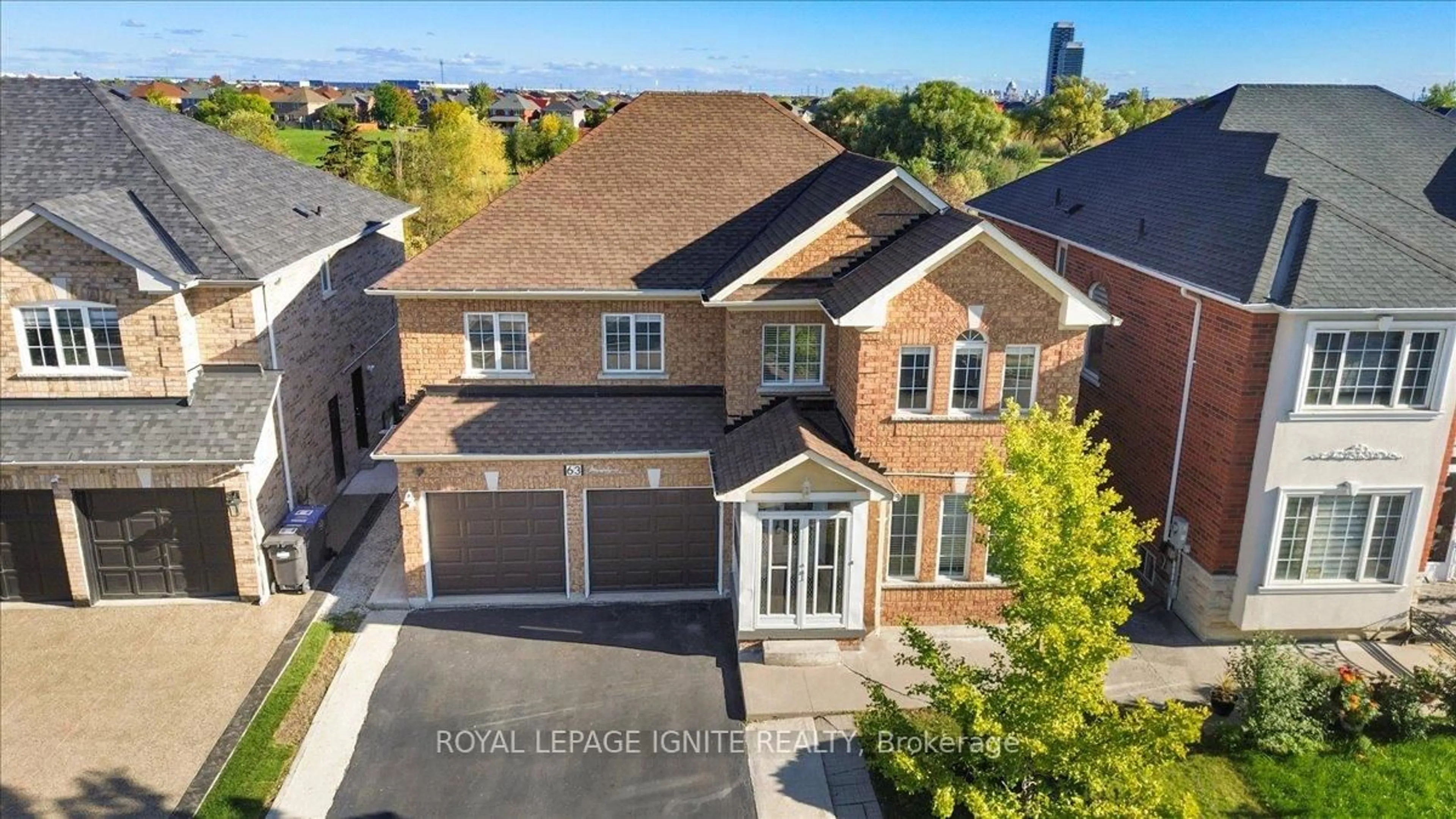 A pic from outside/outdoor area/front of a property/back of a property/a pic from drone, street for 63 Eastbrook Way, Brampton Ontario L6P 1K6