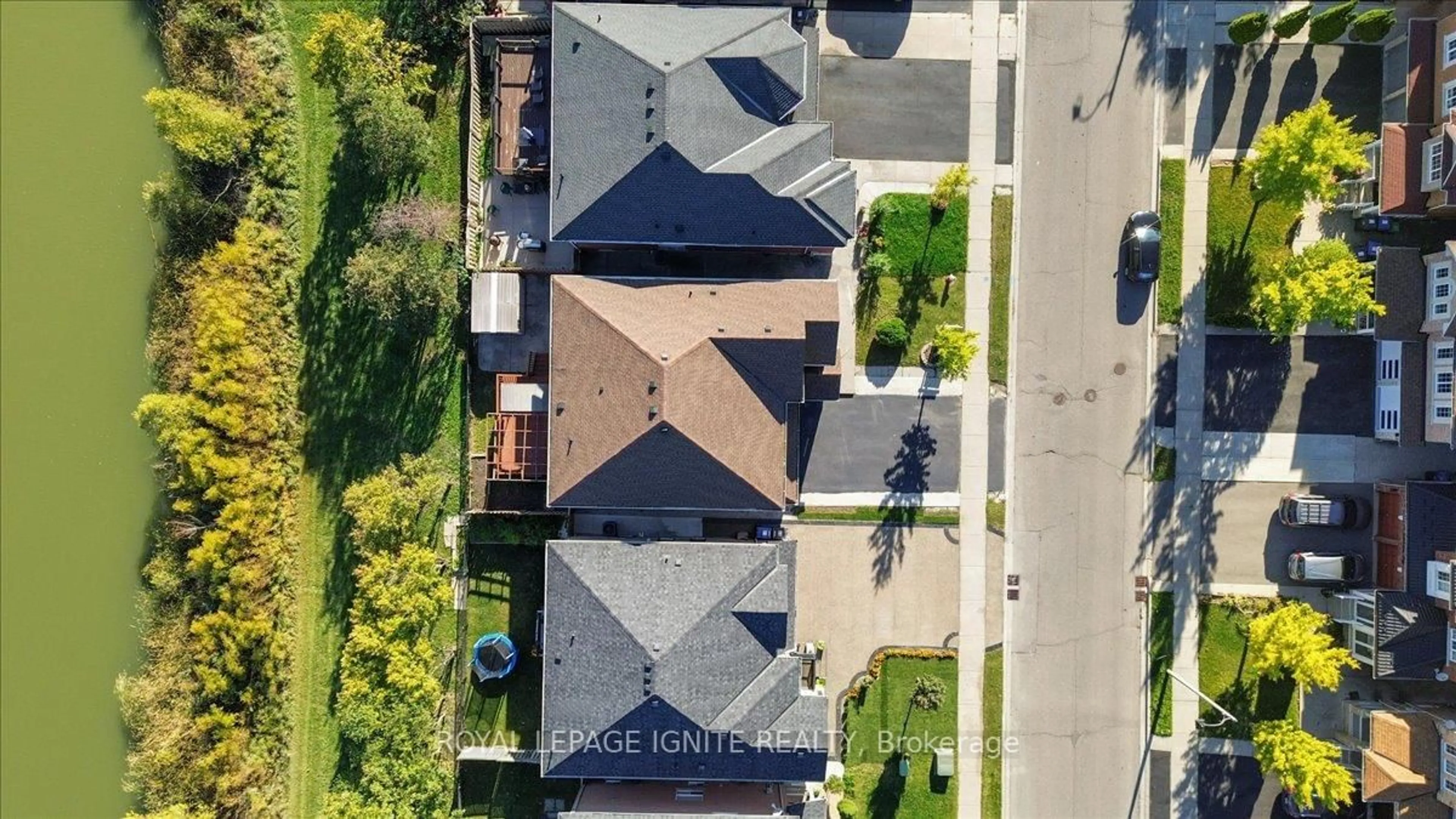 A pic from outside/outdoor area/front of a property/back of a property/a pic from drone, street for 63 Eastbrook Way, Brampton Ontario L6P 1K6