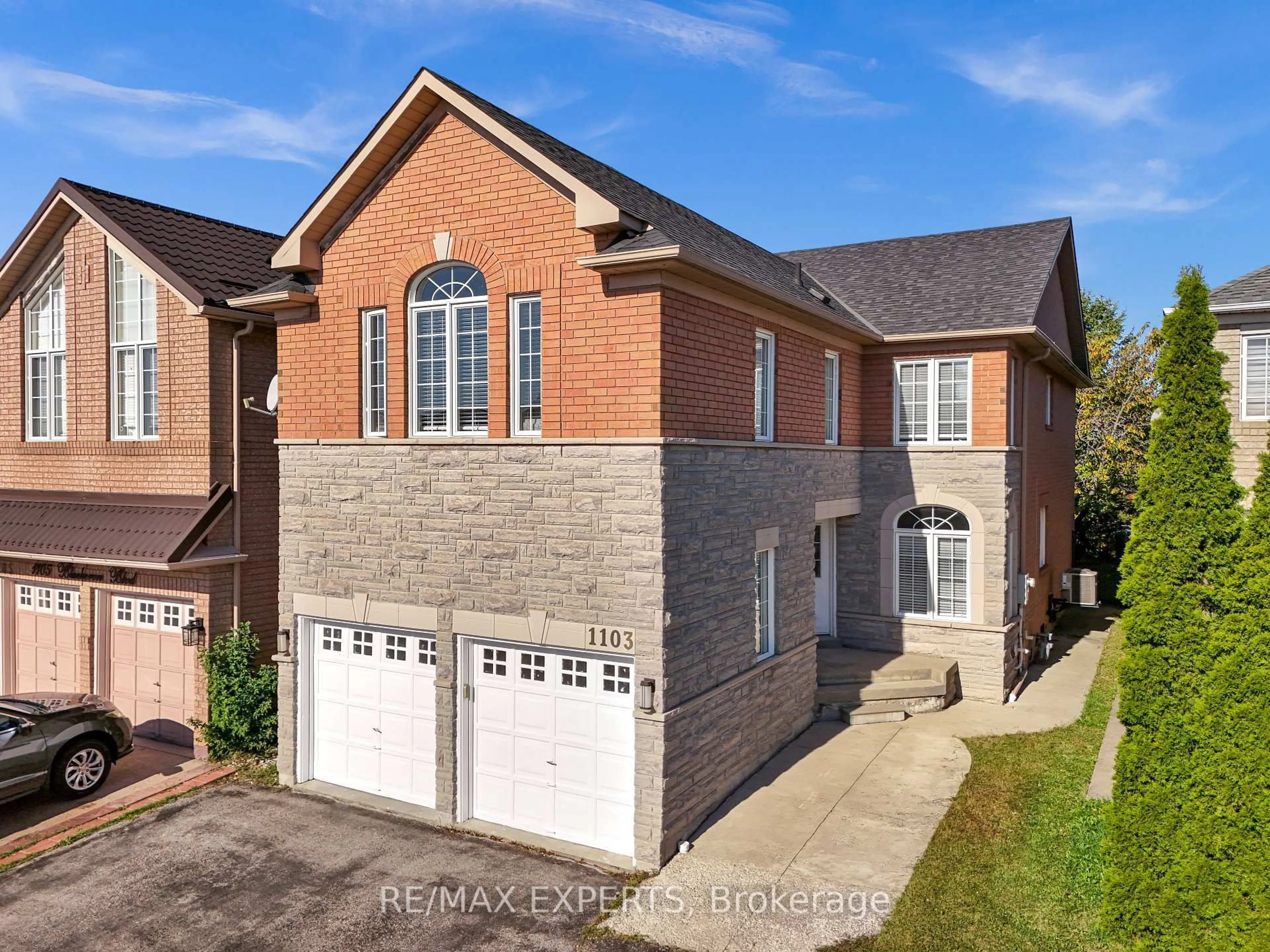 Home with brick exterior material, street for 1103 Blueheron Blvd, Mississauga Ontario L5V 2J7