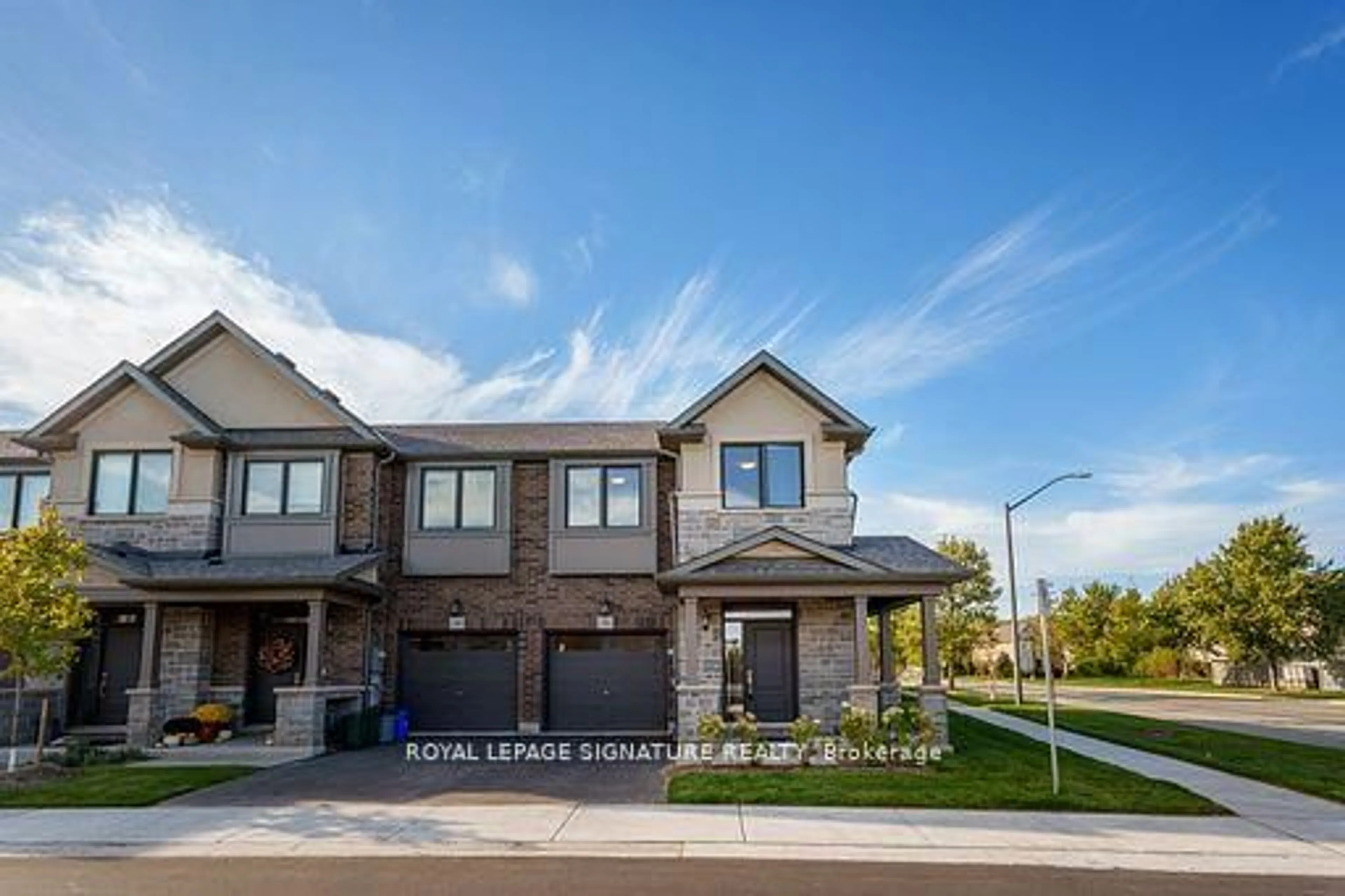 Home with brick exterior material, street for 2184 Postmaster Dr #1, Oakville Ontario L6M 3X1