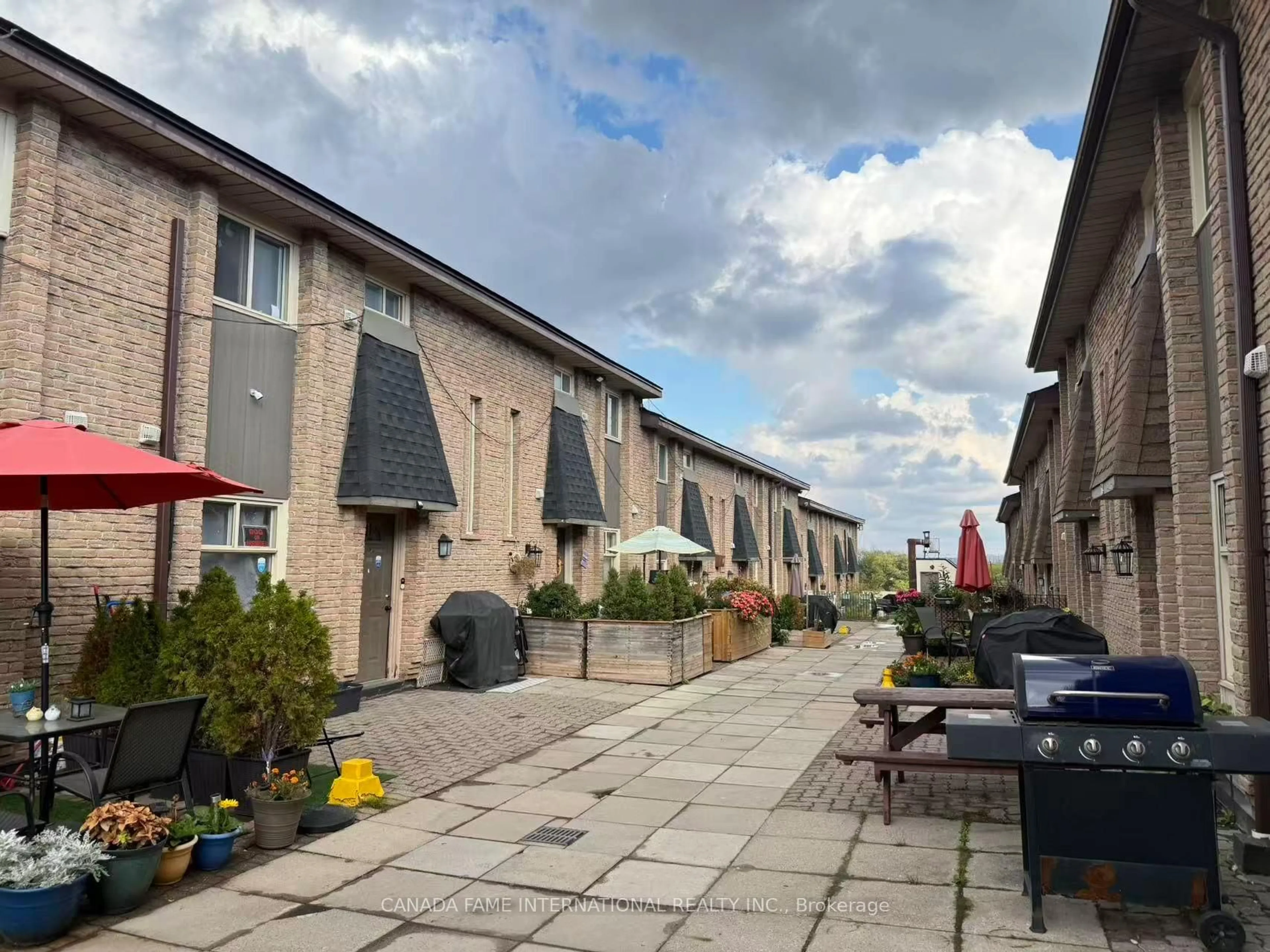 A pic from outside/outdoor area/front of a property/back of a property/a pic from drone, street for 16 Rexdale Blvd #52, Toronto Ontario M9W 5Z3