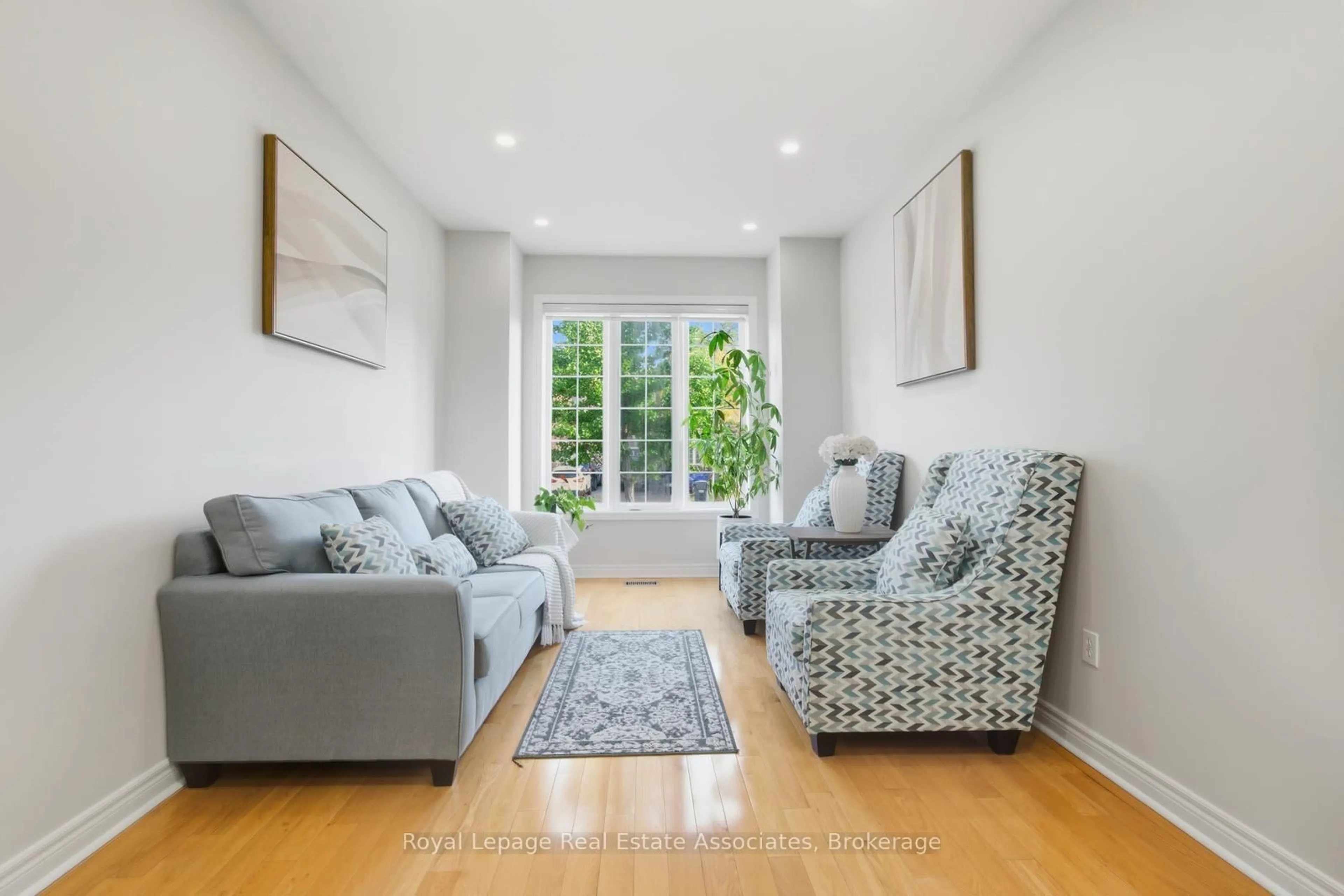 Living room with furniture, unknown for 66 Millhouse Mews, Brampton Ontario L6Y 5J8