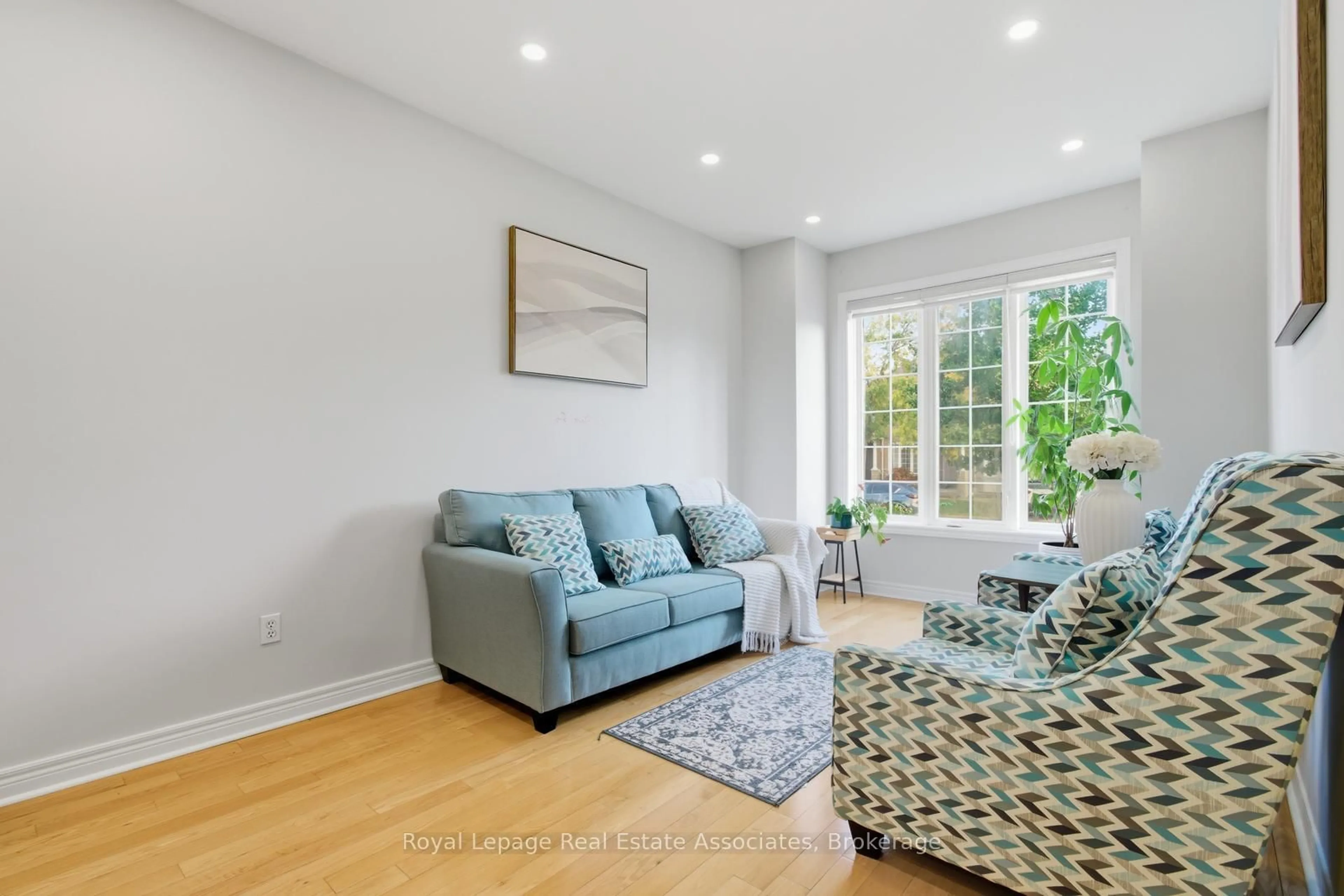Living room with furniture, unknown for 66 Millhouse Mews, Brampton Ontario L6Y 5J8