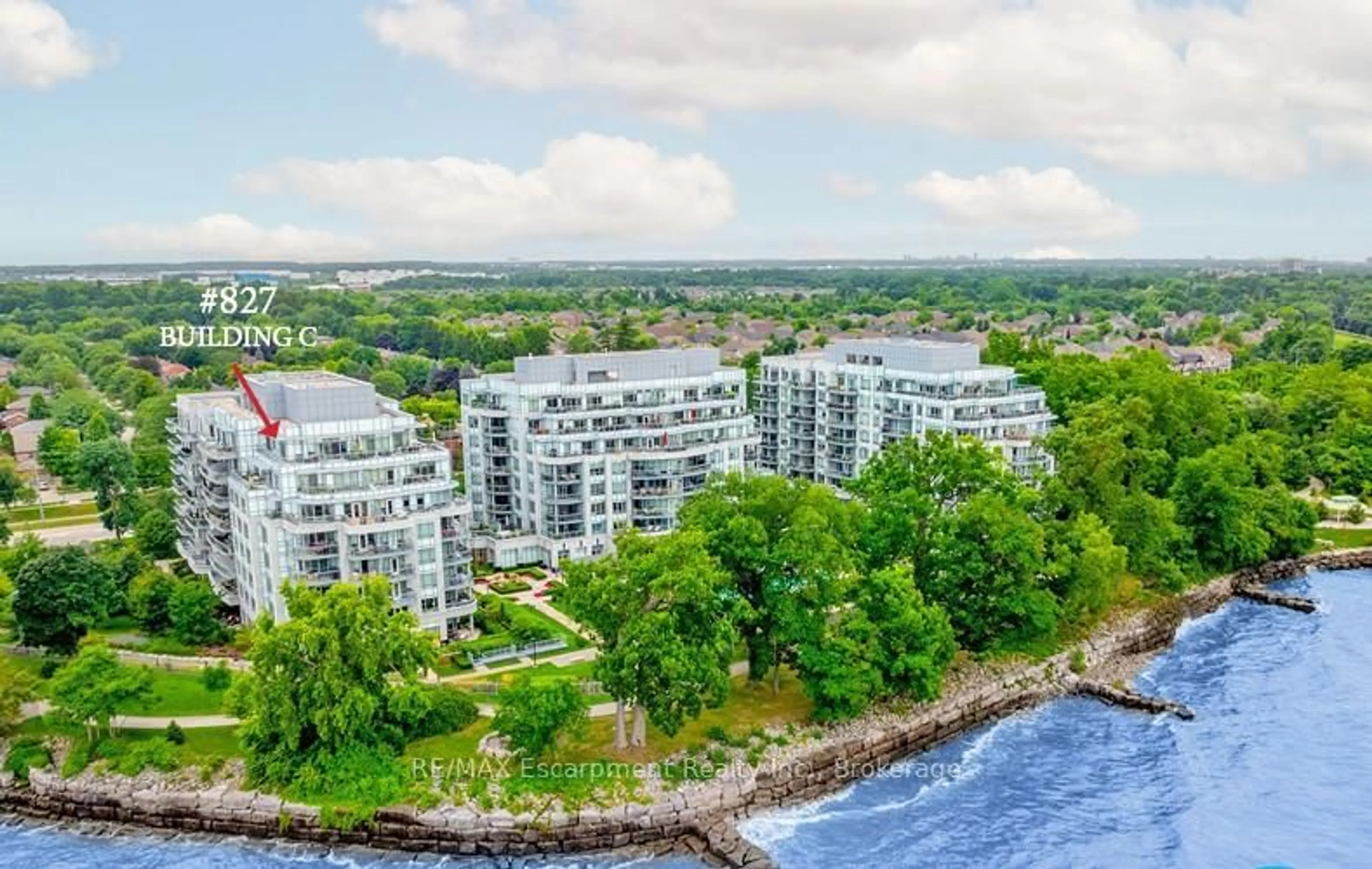 A pic from outside/outdoor area/front of a property/back of a property/a pic from drone, water/lake/river/ocean view for 3500 Lakeshore Rd #827, Oakville Ontario L6L 0B4