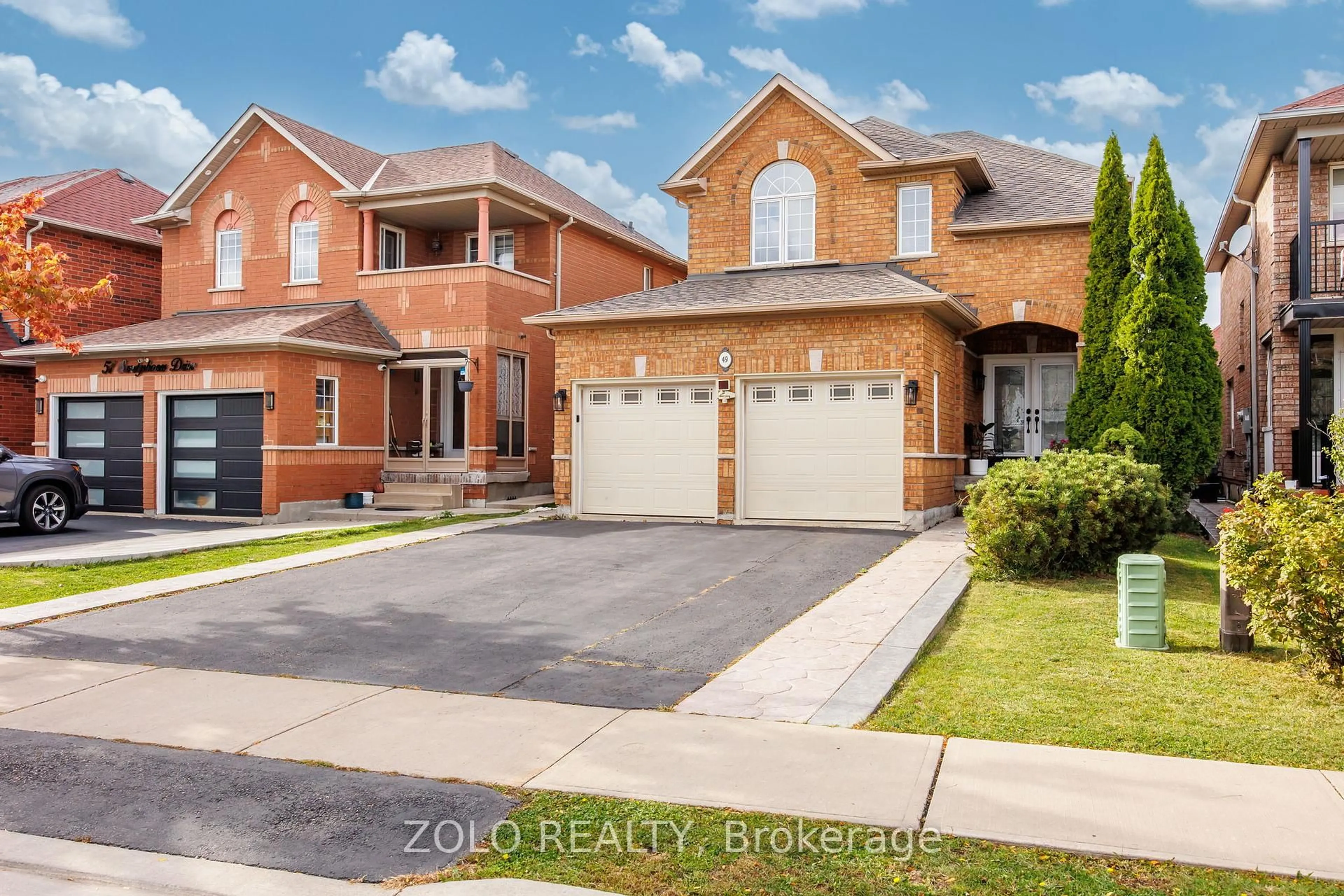 Home with brick exterior material, street for 49 Sandyshores Dr, Brampton Ontario L6R 2H3