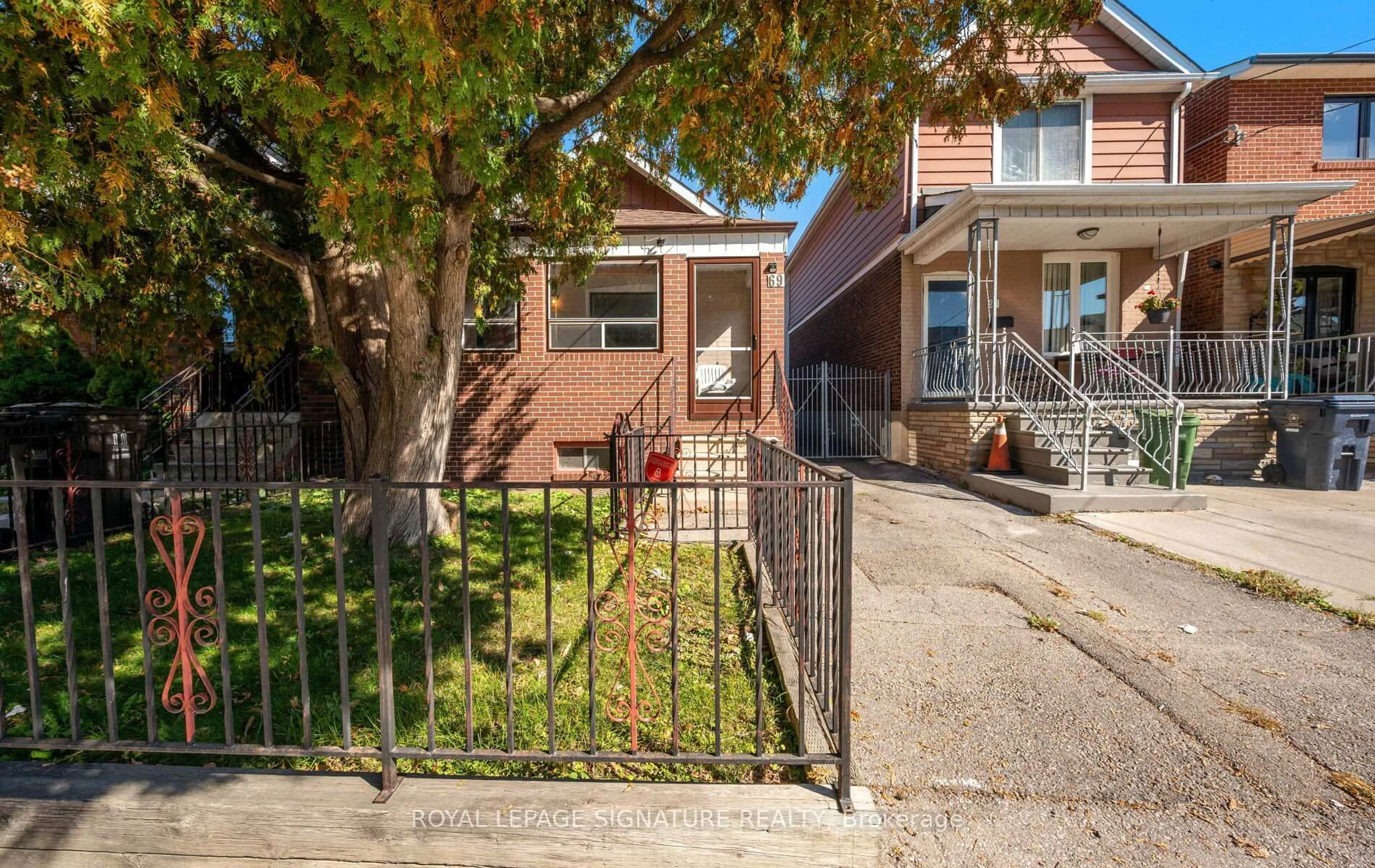 Home with brick exterior material, street for 69 Chambers Ave, Toronto Ontario M6N 3M1