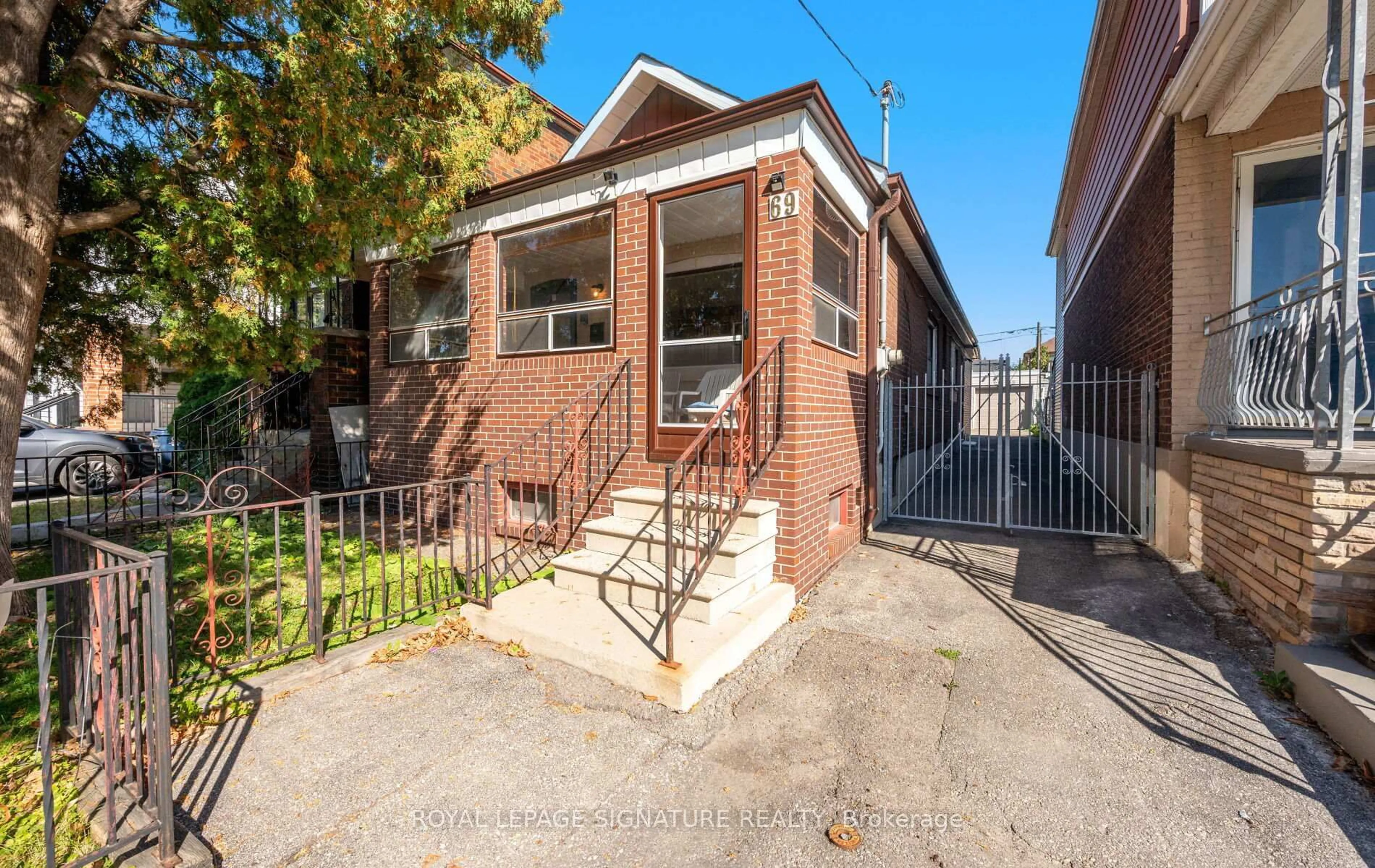 Home with brick exterior material, street for 69 Chambers Ave, Toronto Ontario M6N 3M1