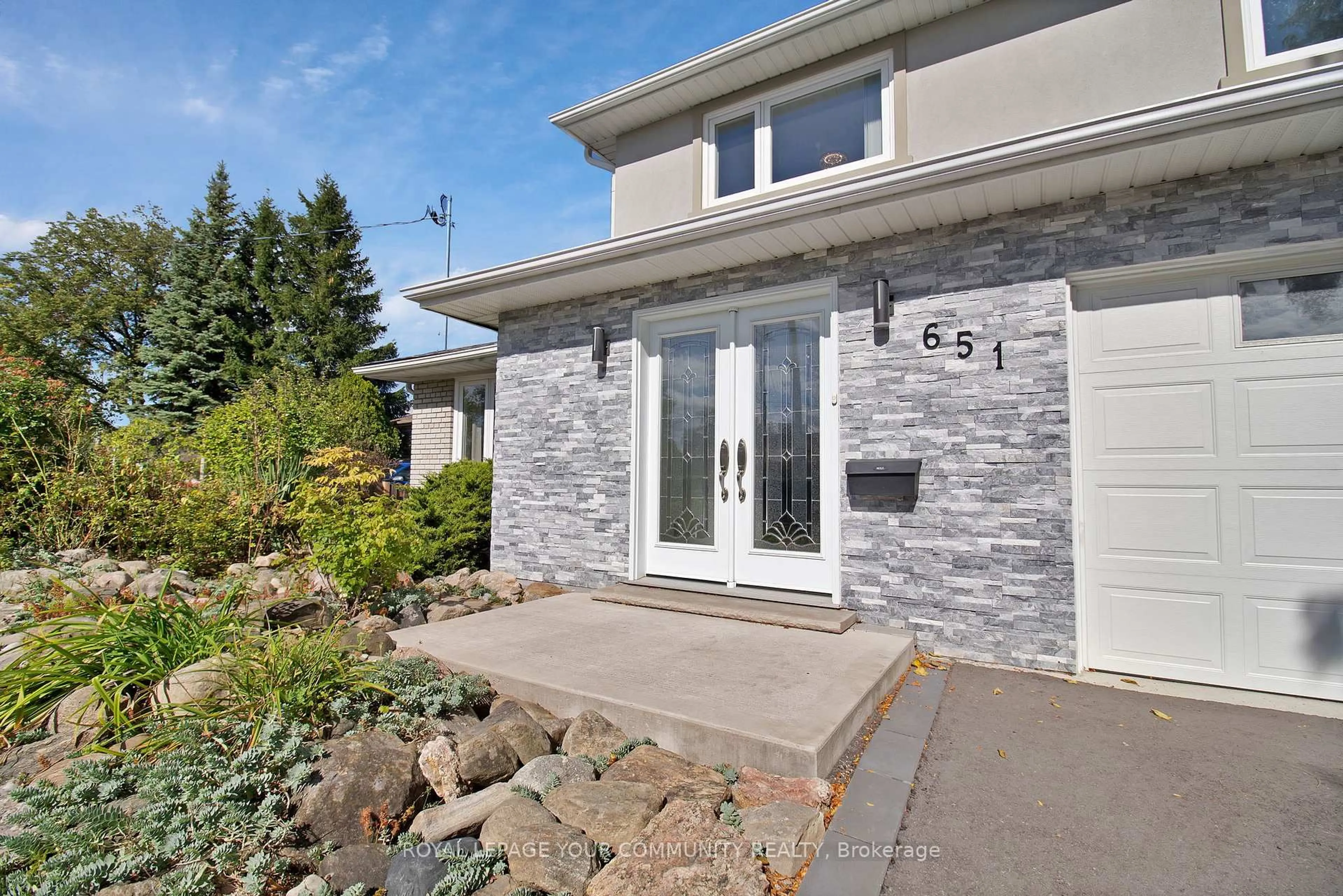 Home with brick exterior material, street for 651 Burnhamthorpe Rd, Toronto Ontario M9C 2Z1