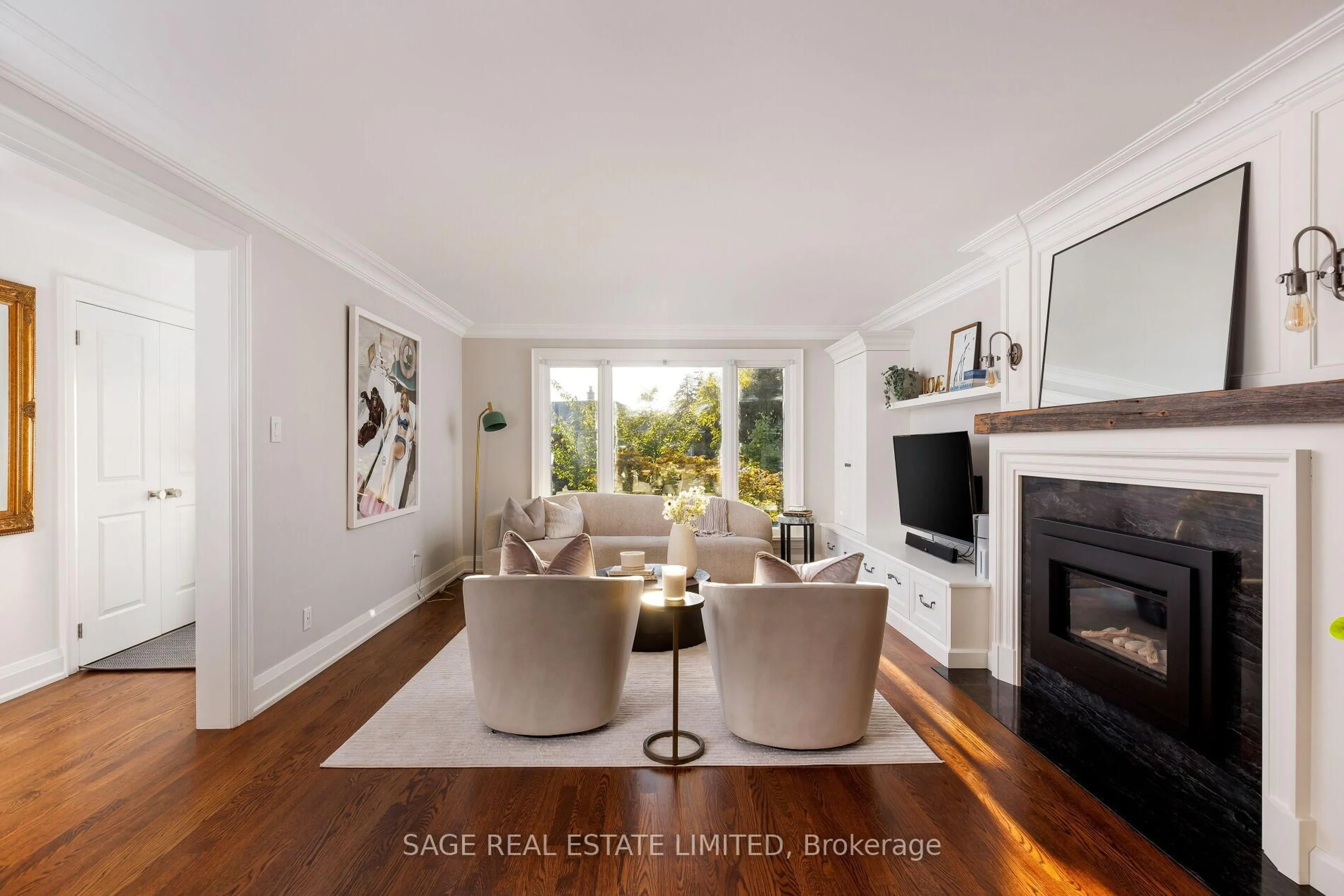 Living room with furniture, wood/laminate floor for 45 Newstead Rd, Toronto Ontario M9P 3G2