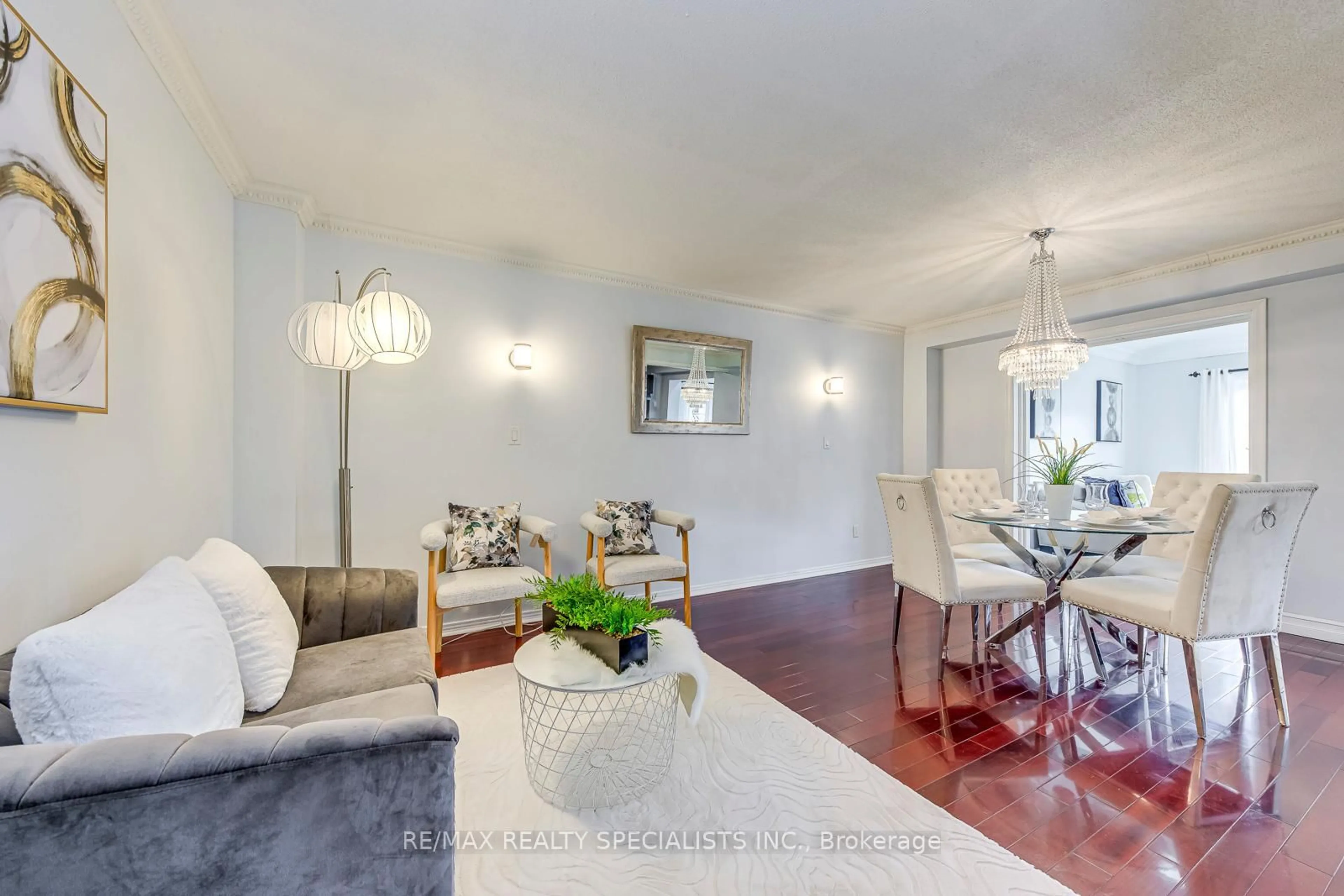 Living room with furniture, wood/laminate floor for 730 Galloway Cres, Mississauga Ontario L5C 3W1