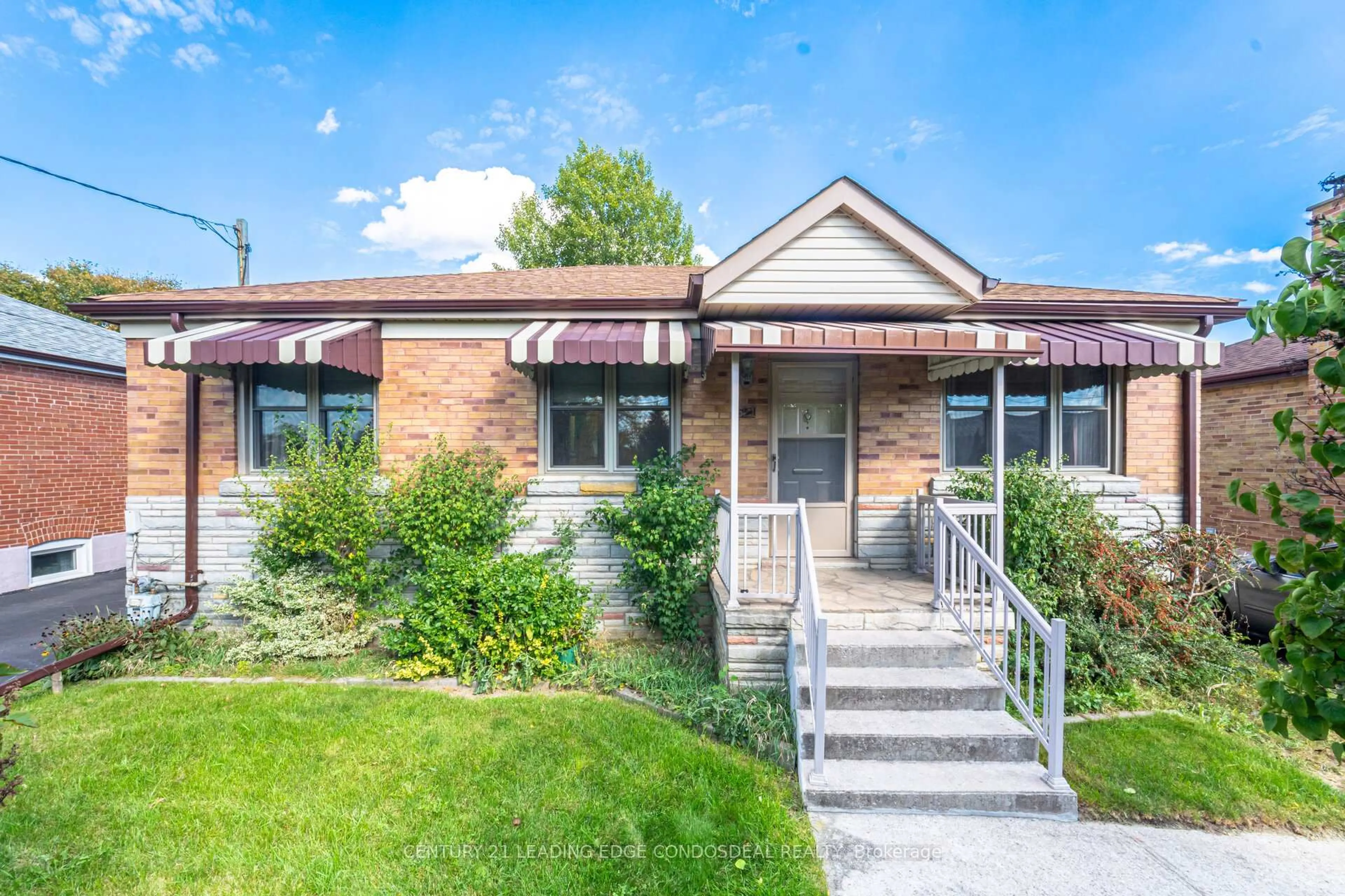 Home with brick exterior material, street for 621 Roding St, Toronto Ontario M3M 2A6
