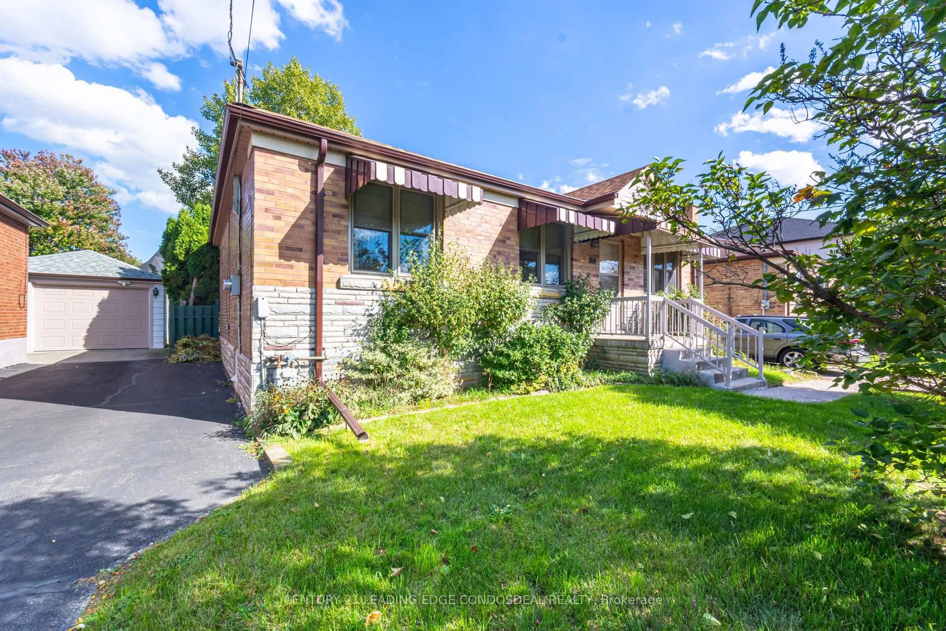 Home with brick exterior material, street for 621 Roding St, Toronto Ontario M3M 2A6