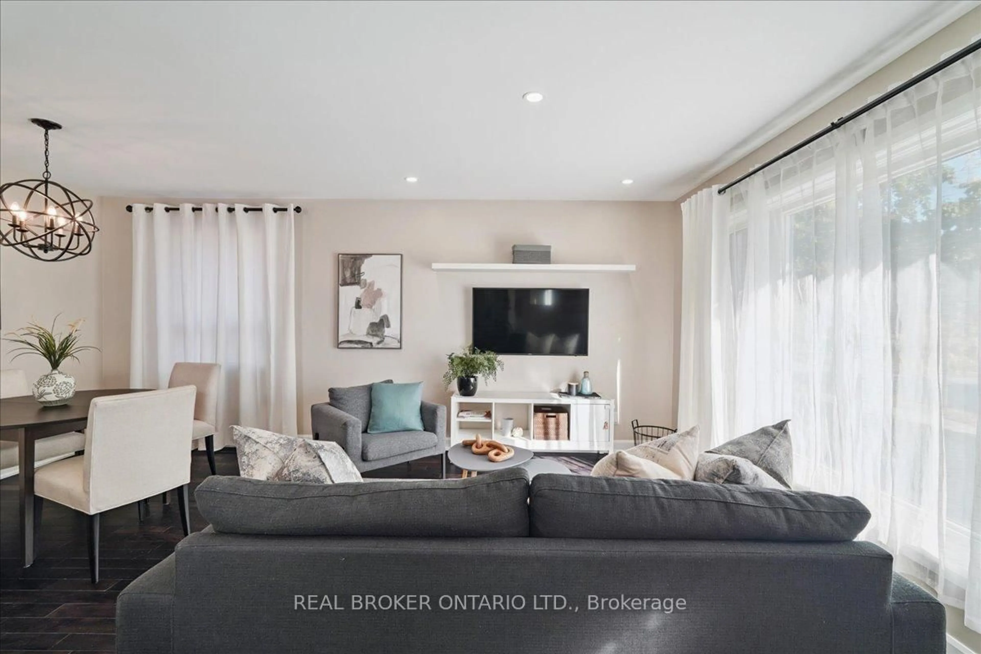 Living room with furniture, unknown for 12 Margrath Pl, Toronto Ontario M9C 4L2