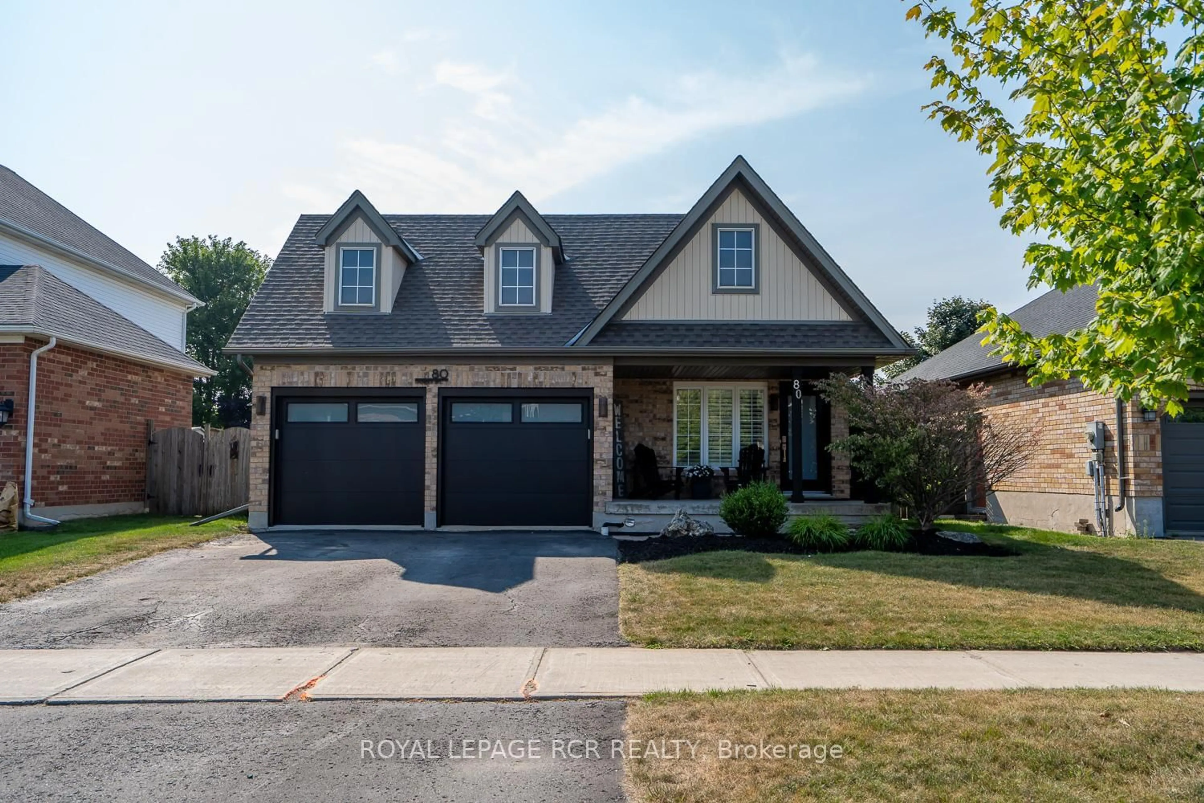 Home with brick exterior material, street for 80 Spencer Ave, Orangeville Ontario L9W 5E7