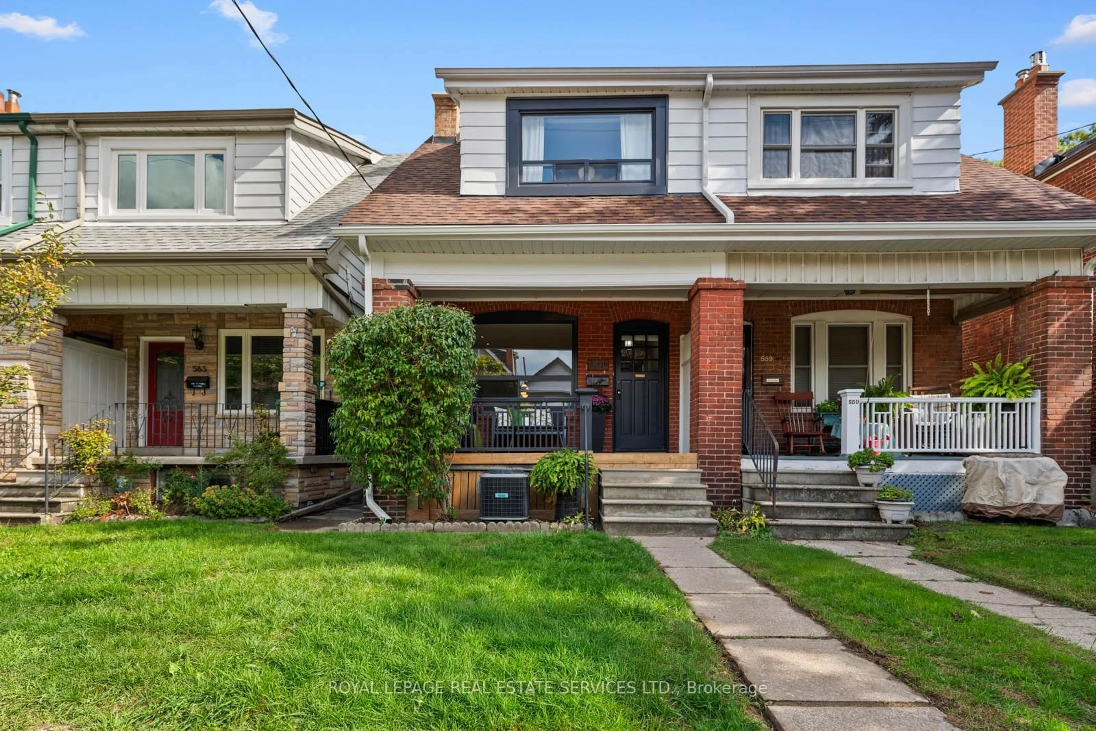 Home with brick exterior material, street for 561 Beresford Ave, Toronto Ontario M6S 3C2