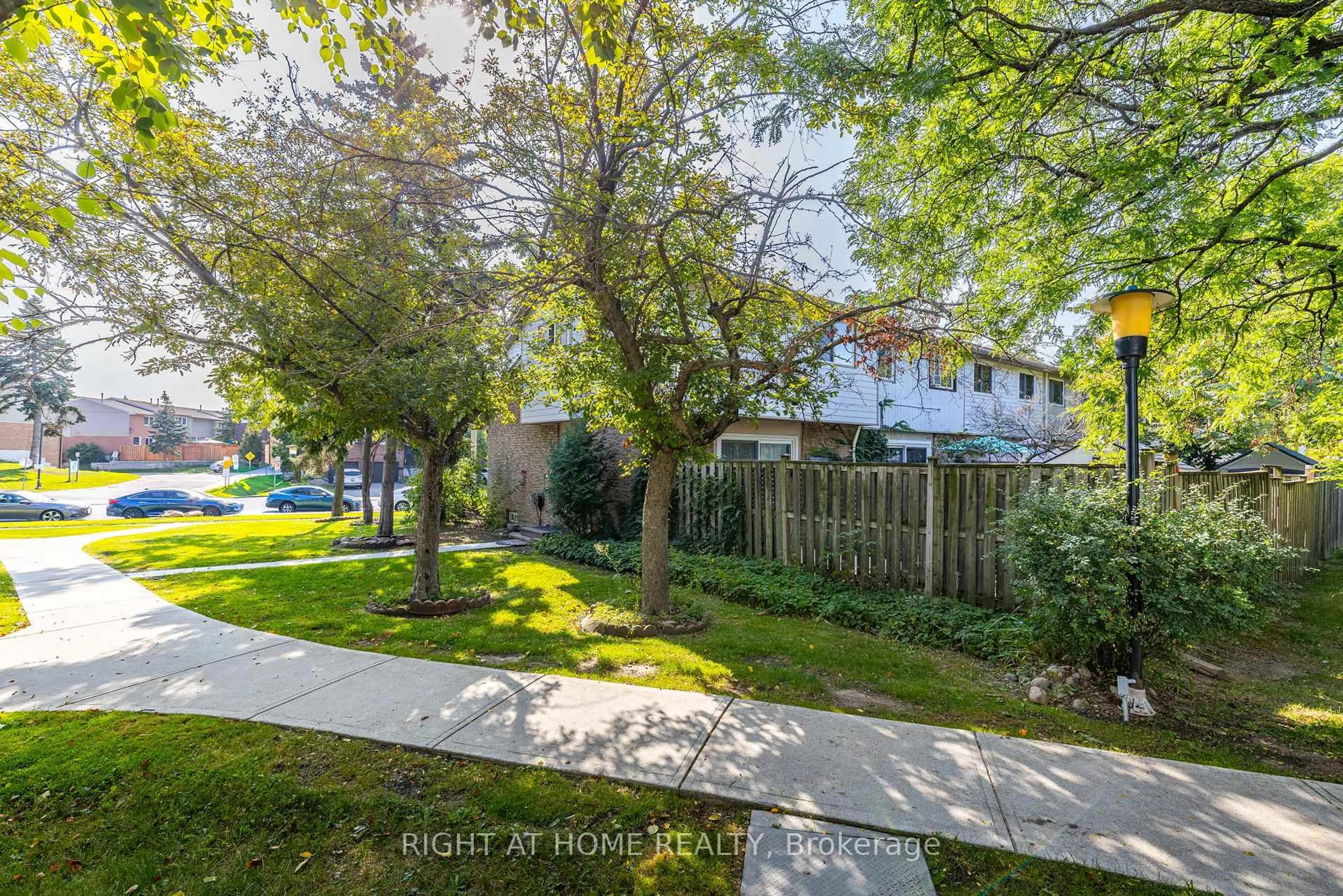 A pic from outside/outdoor area/front of a property/back of a property/a pic from drone, street for 6540 Falconer Dr #30, Mississauga Ontario L5N 1M1
