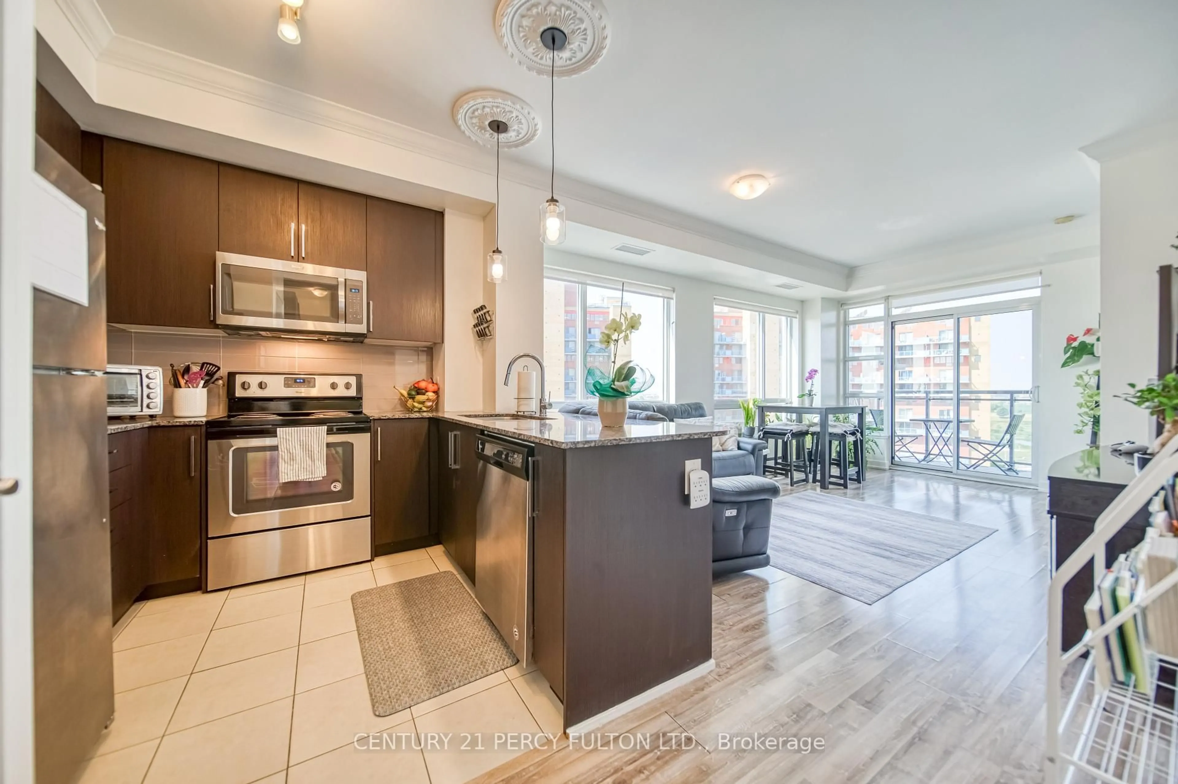 Open concept kitchen, ceramic/tile floor for 840 Queens Plate Dr #902, Toronto Ontario M9W 7J9