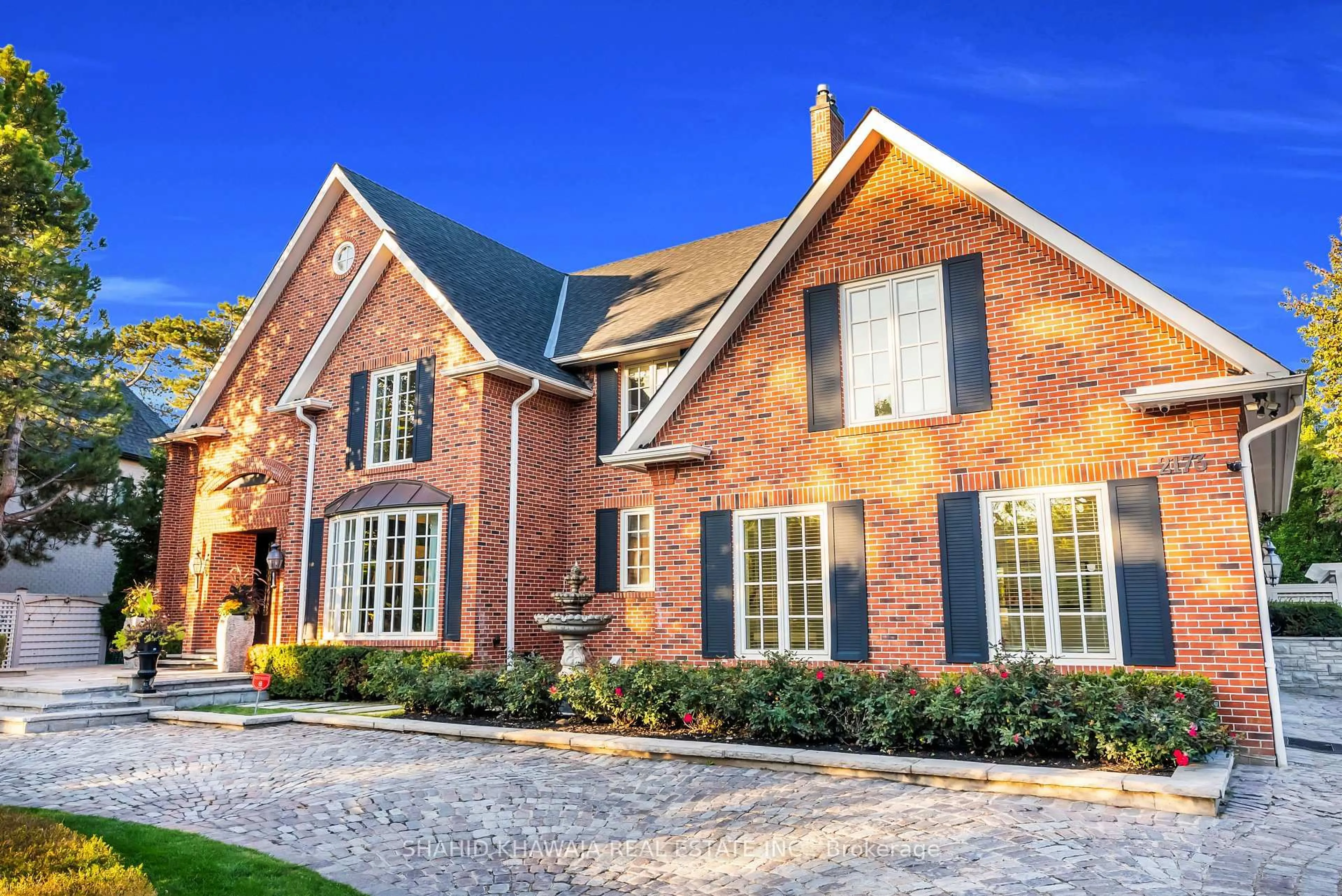 Home with brick exterior material, street for 2173 Shawanaga Tr, Mississauga Ontario L5H 3X6