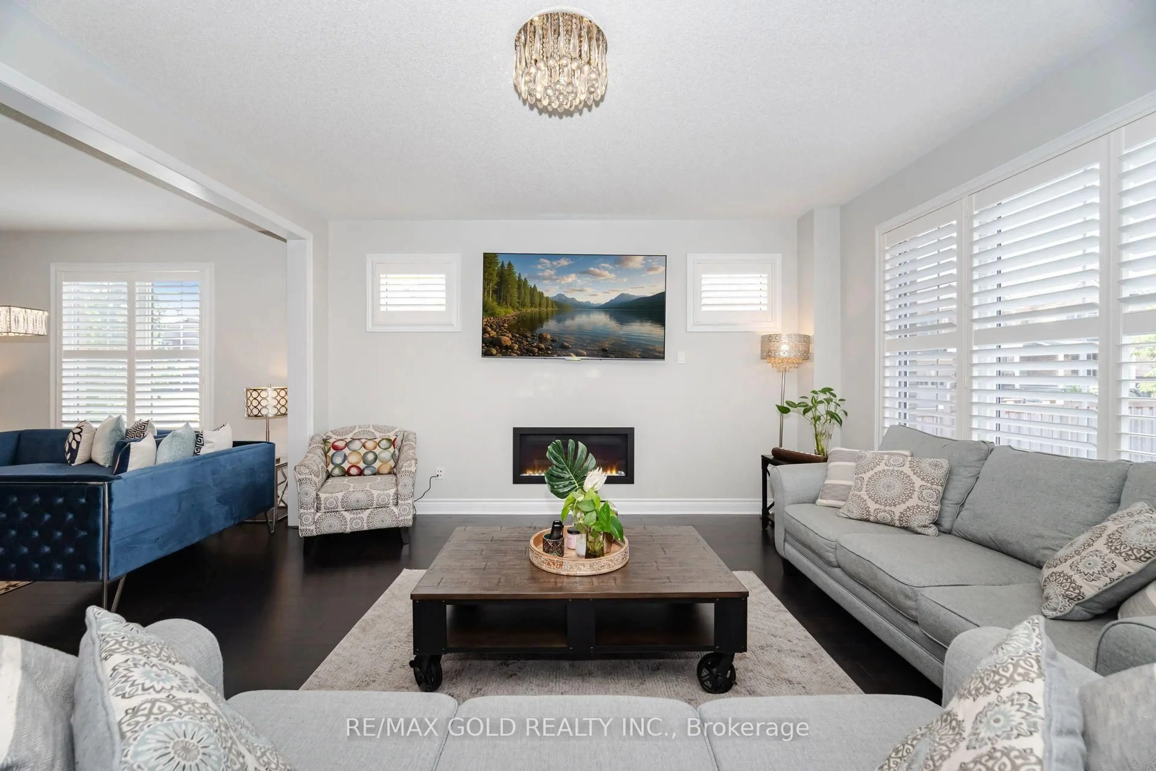 Living room with furniture, wood/laminate floor for 15 Henry Wilson Dr, Caledon Ontario L7C 4E8
