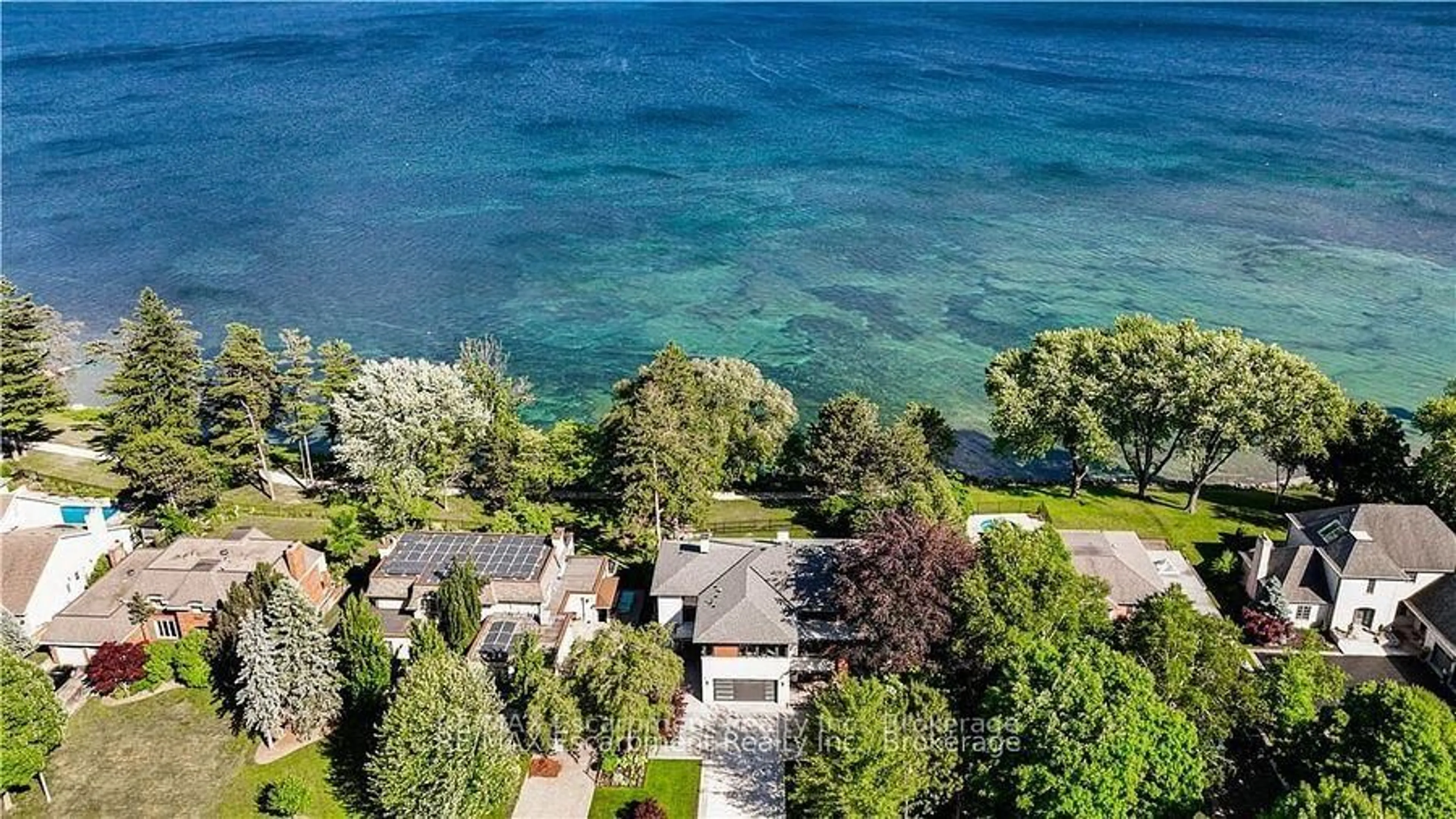 A pic from outside/outdoor area/front of a property/back of a property/a pic from drone, water/lake/river/ocean view for 2250 Chancery Lane, Oakville Ontario L6J 6A3
