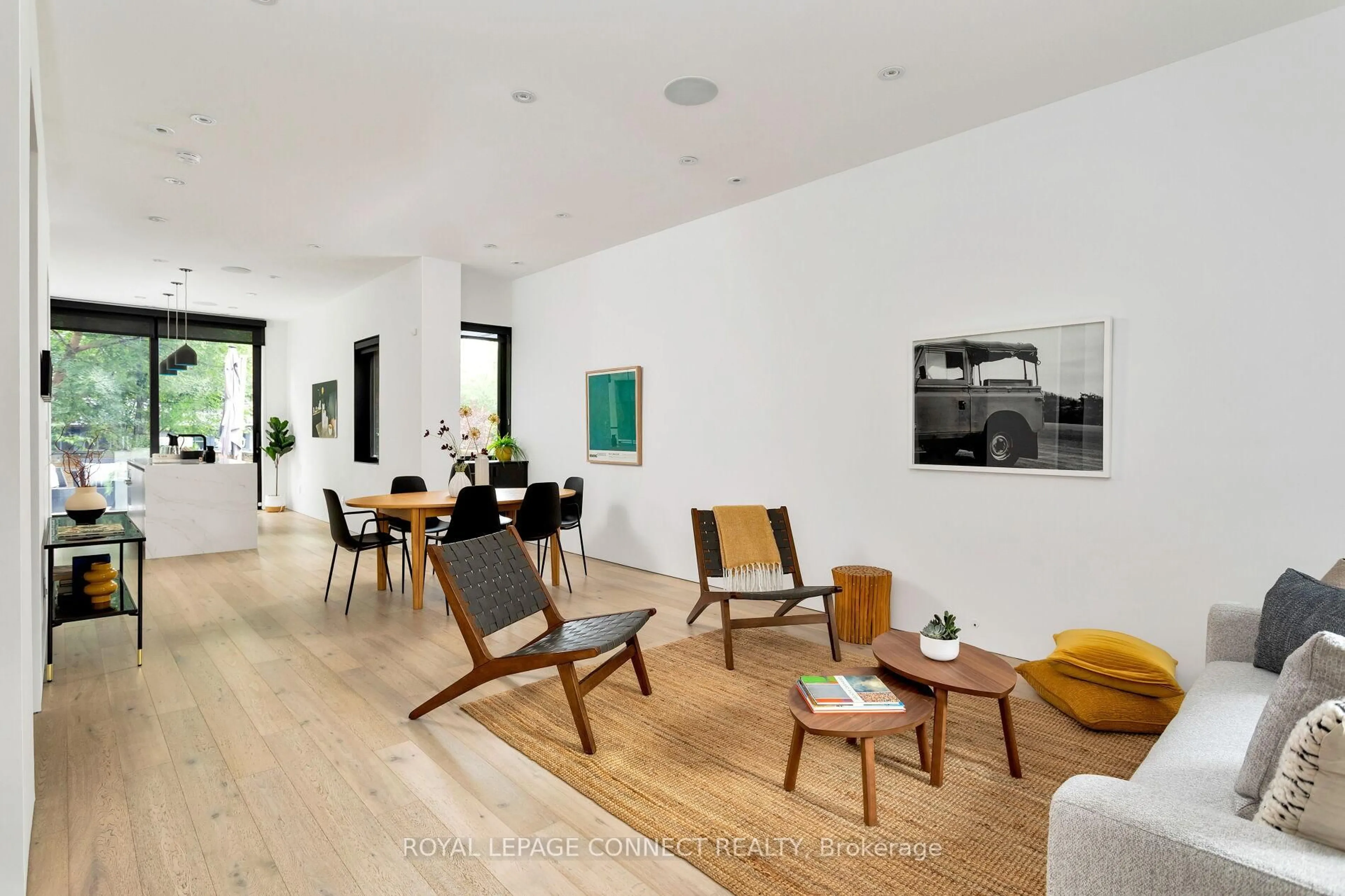 Living room with furniture, wood/laminate floor for 59 Fuller Ave, Toronto Ontario M6R 2C4