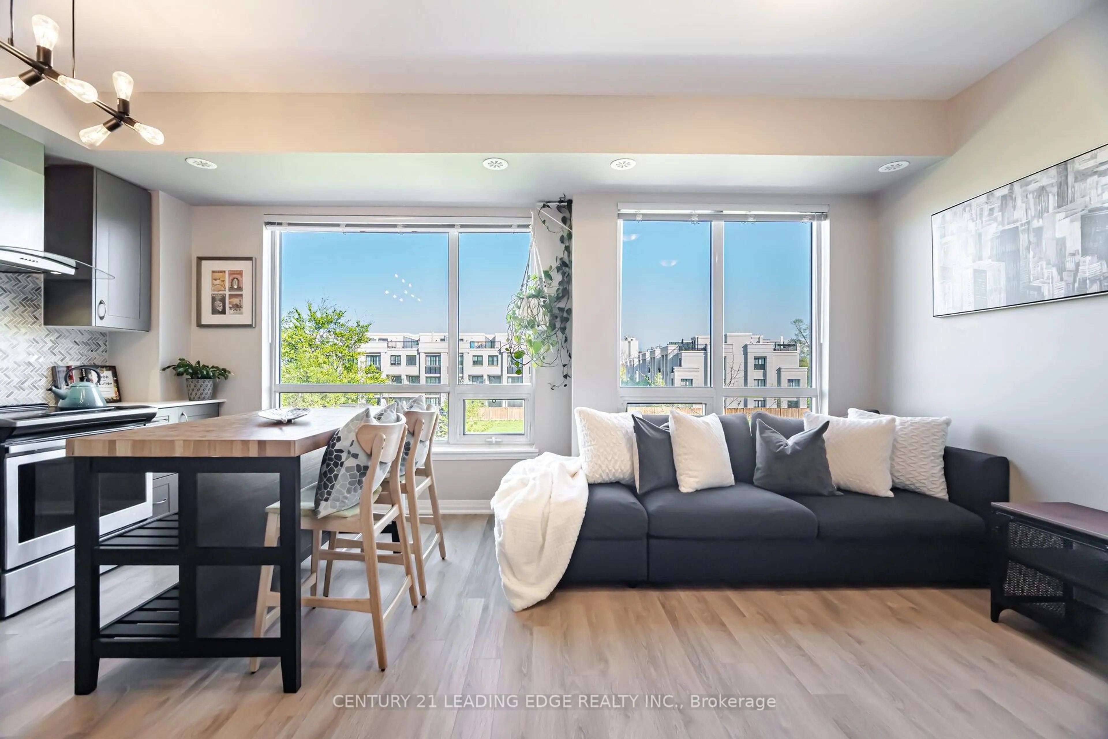 Living room with furniture, wood/laminate floor for 650 Atwater Ave #35, Mississauga Ontario L5G 4K7