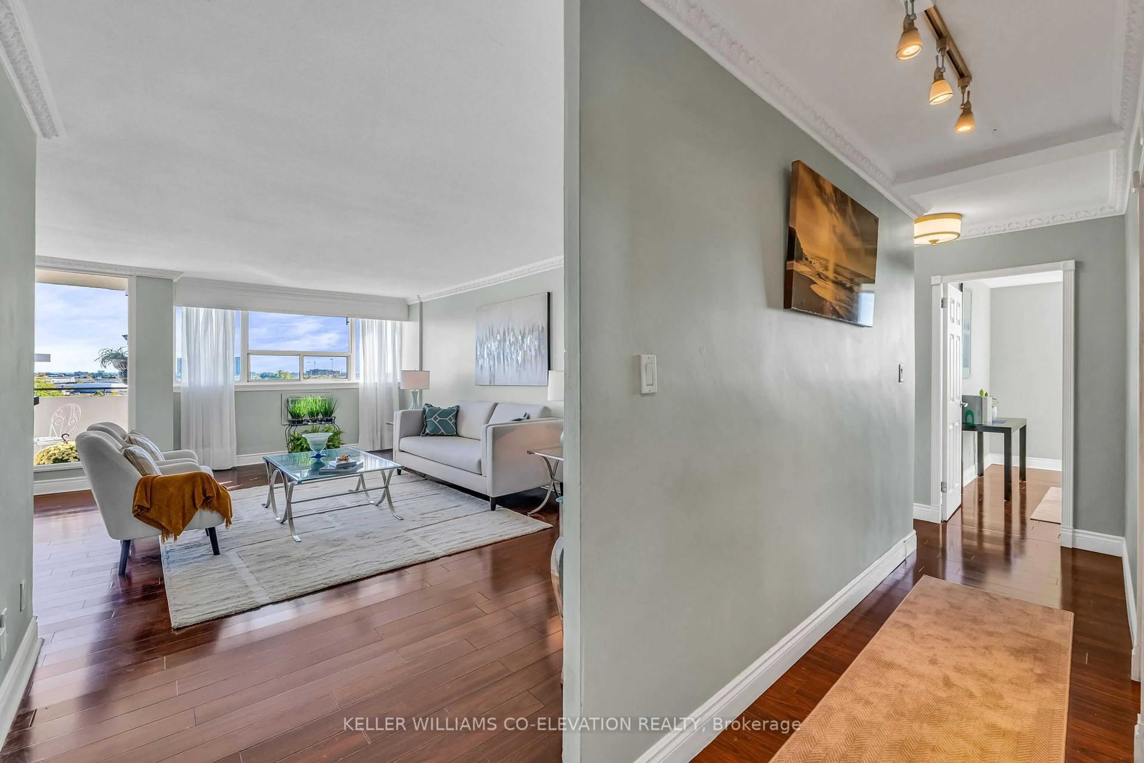Living room with furniture, unknown for 14 Neilson Dr #702, Toronto Ontario M9C 1V6