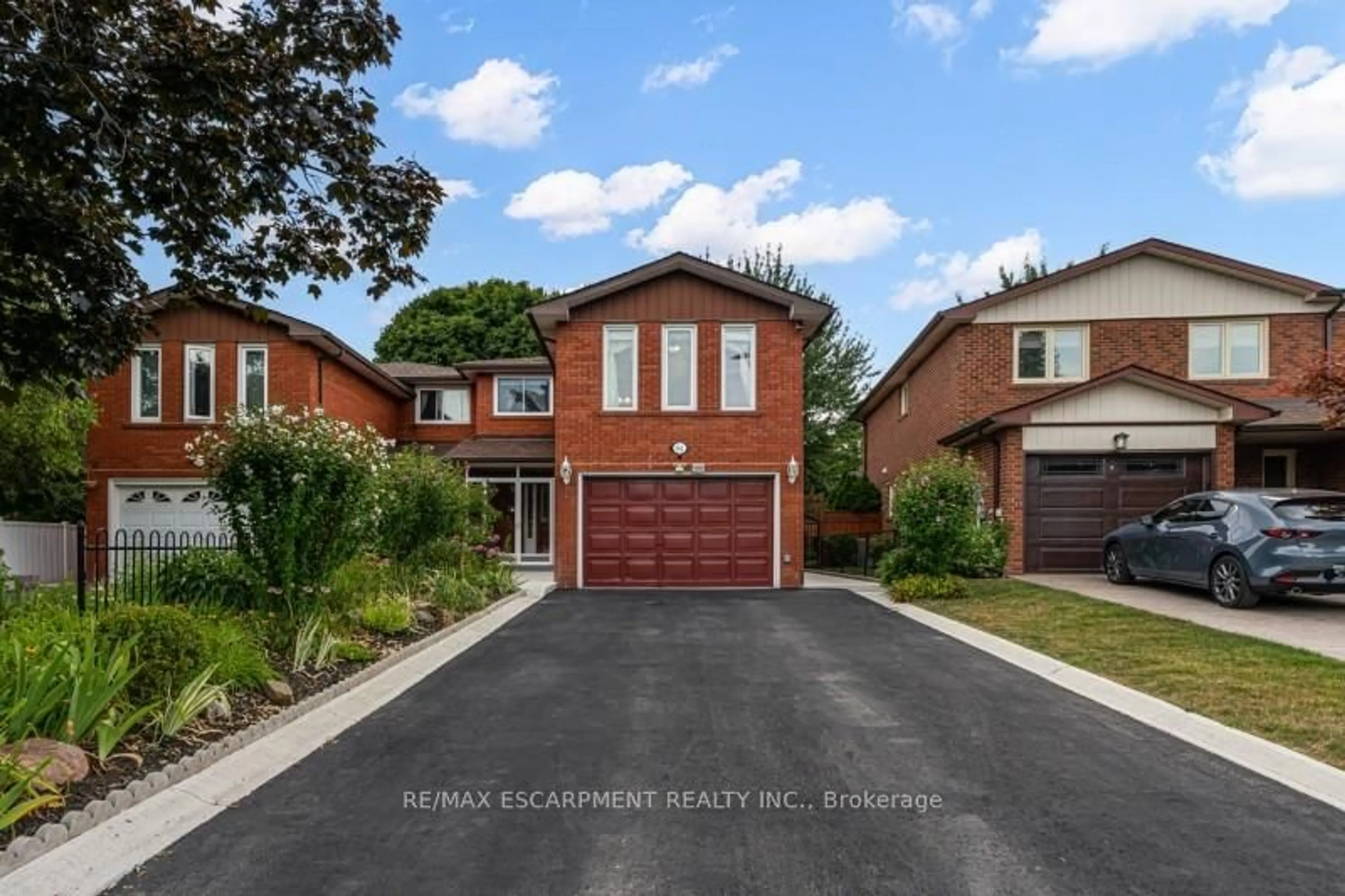 Home with brick exterior material, street for 94 Bremen Lane, Mississauga Ontario L5M 2N5